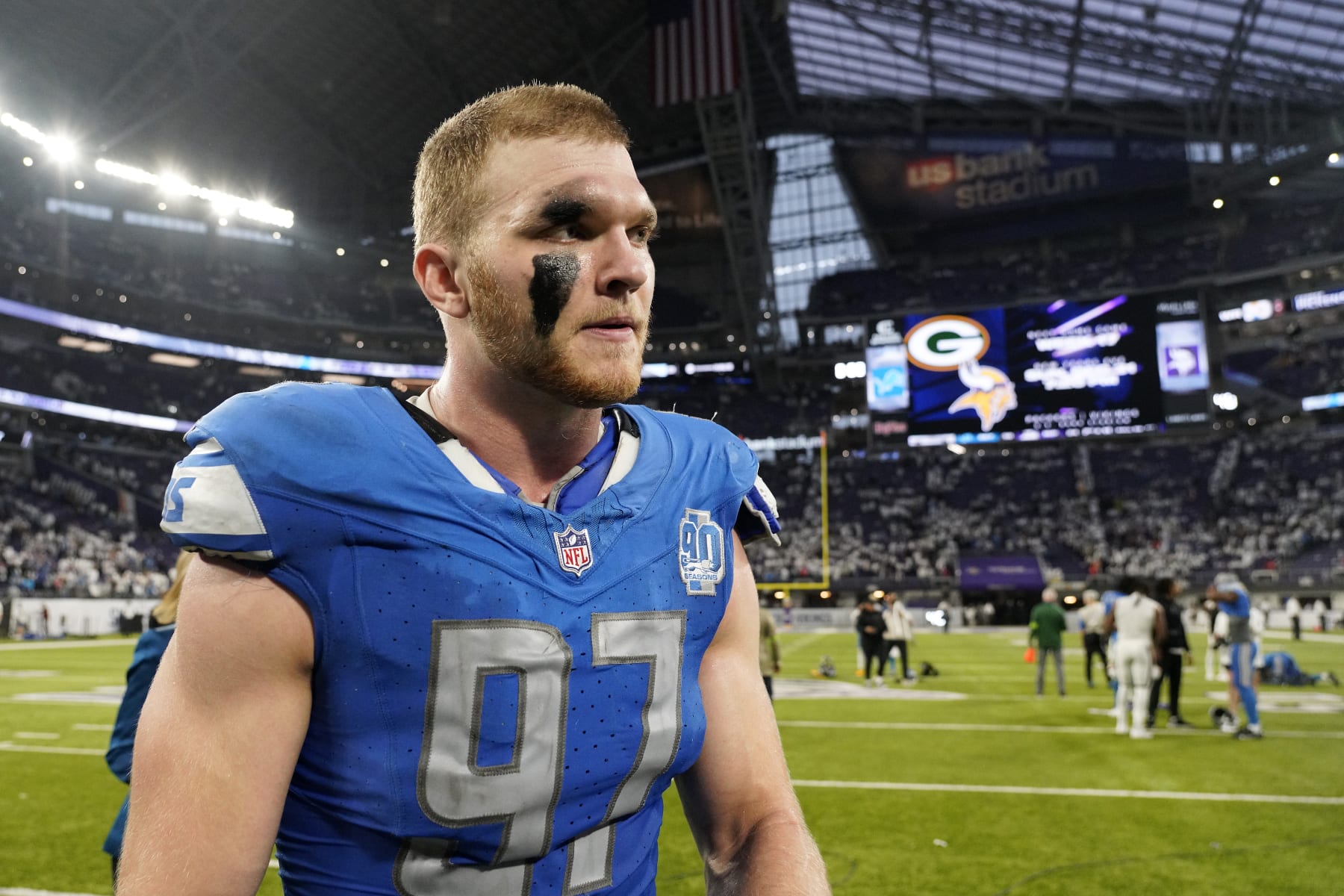 MINNEAPOLIS, MINNESOTA - DECEMBER 24:  Aidan Hutchinson #97 of the Detroit Lions walks off the field following the 30-24 win \am at U.S. Bank Stadium on December 24, 2023 in Minneapolis, Minnesota. (Photo by David Berding/Getty Images)