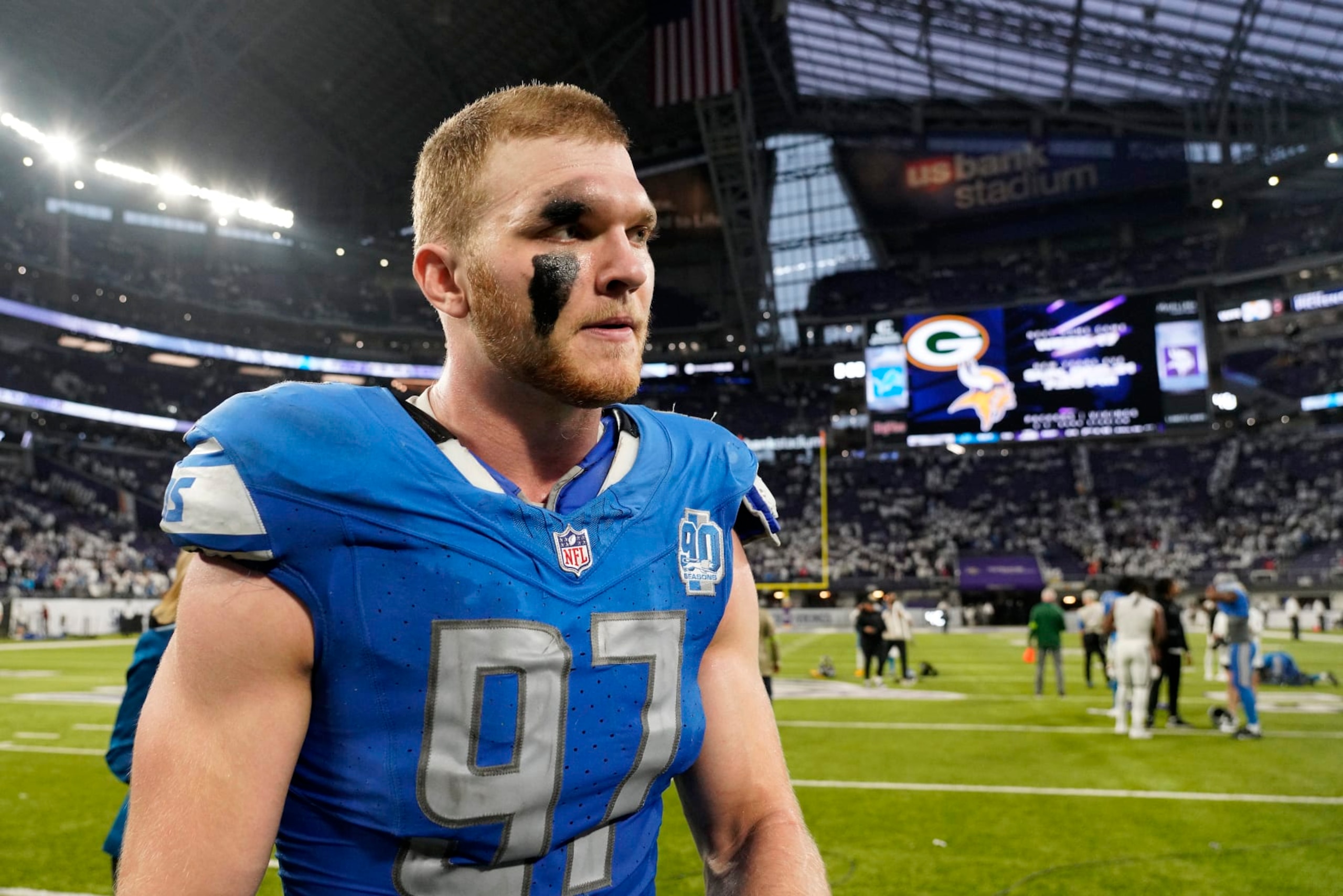 MINNEAPOLIS, MINNESOTA - DECEMBER 24:  Aidan Hutchinson #97 of the Detroit Lions walks off the field following the 30-24 win \am at U.S. Bank Stadium on December 24, 2023 in Minneapolis, Minnesota. (Photo by David Berding/Getty Images)