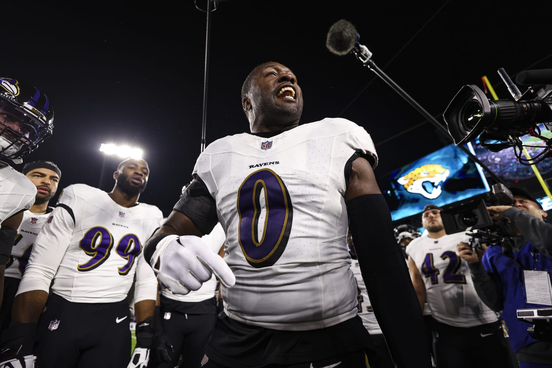 JACKSONVILLE, FL - DECEMBER 17: Roquan Smith #0 of the Baltimore Ravens leads a huddle prior to an NFL football game against the Jacksonville Jaguars at EverBank Stadium on December 17, 2023 in Jacksonville, Florida. (Photo by Perry Knotts/Getty Images)