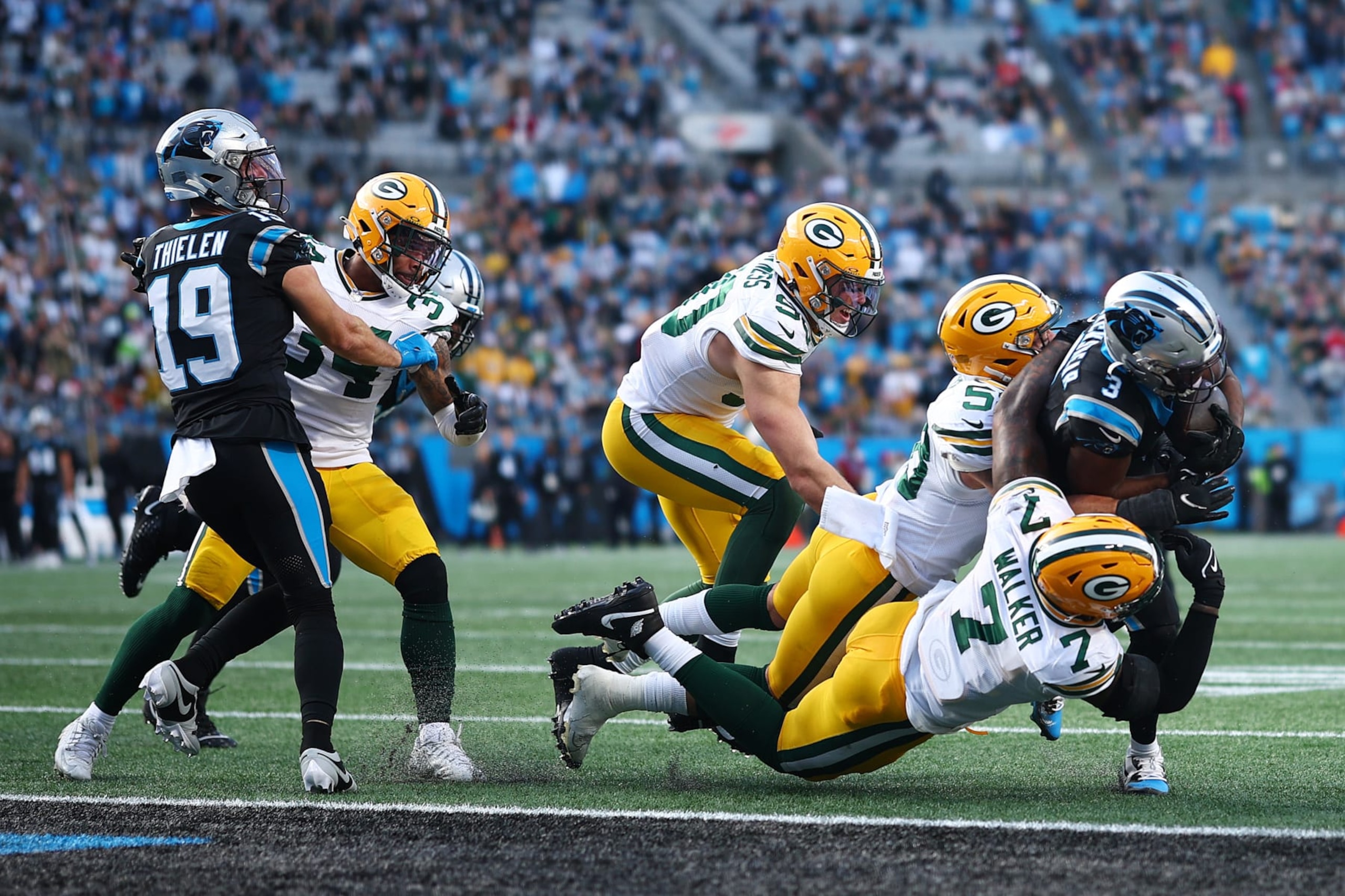CHARLOTTE, NORTH CAROLINA - DECEMBER 24: Raheem Blackshear #3 of the Carolina Panthers scores a two point conversion during the fourth quarter against the Green Bay Packers at Bank of America Stadium on December 24, 2023 in Charlotte, North Carolina. (Photo by Jared C. Tilton/Getty Images)