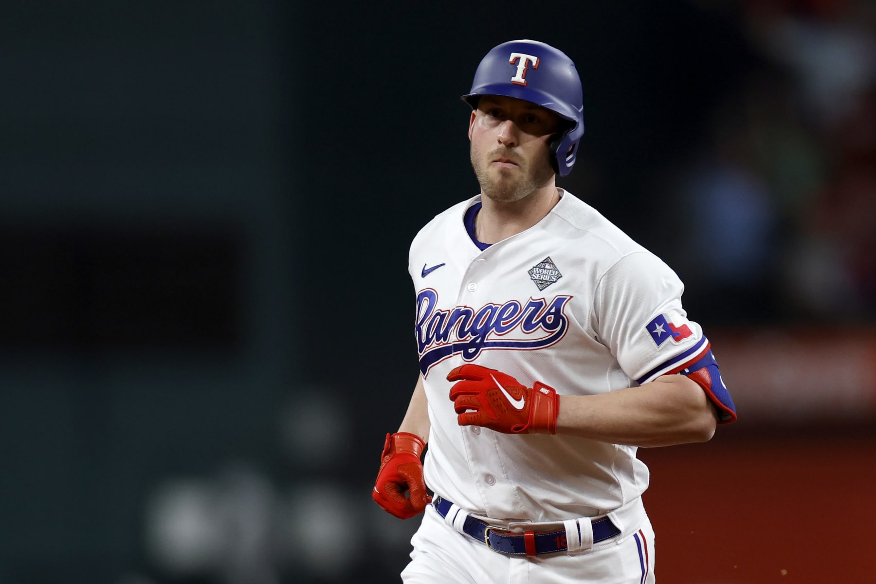 ARLINGTON, TEXAS - OCTOBER 28: Mitch Garver #18 of the Texas Rangers rounds the bases after hitting a home run in the fifth inning against the Arizona Diamondbacks during Game Two of the World Series at Globe Life Field on October 28, 2023 in Arlington, Texas. (Photo by Carmen Mandato/Getty Images)