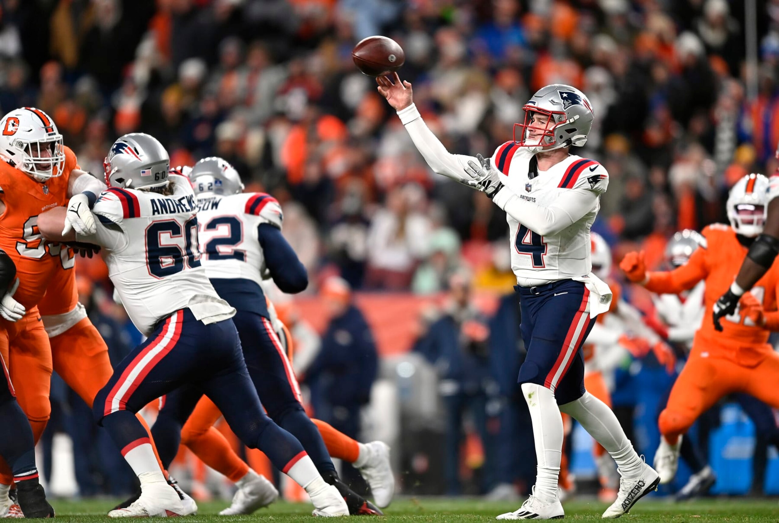 DENVER, COLORADO - DECEMBER 24: Quarterback Bailey Zappe #4 of the New England Patriots passes during the 1st half of the game against the Denver Broncos at Empower Field At Mile High on December 24, 2023 in Denver, Colorado. (Photo by Dustin Bradford/Getty Images) DENVER, COLORADO - DECEMBER 24: Quarterback Bailey Zappe #4 of the New England Patriots passes during the 1st half of the game against the Denver Broncos at Empower Field At Mile High on December 24, 2023 in Denver, Colorado. (Photo by Dustin Bradford/Getty Images)