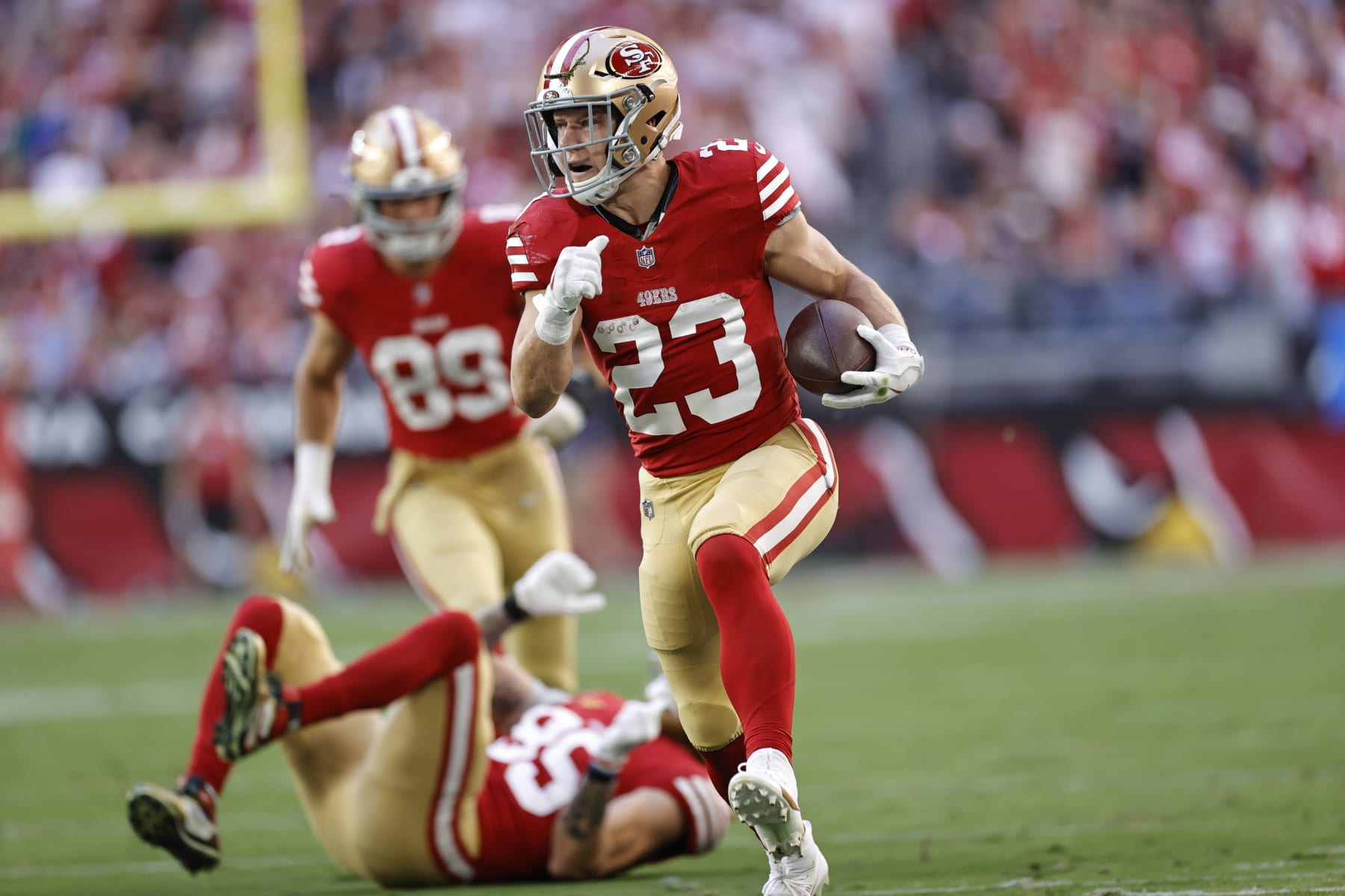 GLENDALE, AZ - DECEMBER 17: Christian McCaffrey #23 of the San Francisco 49ers rushes during the game against the Arizona Cardinals at State Farm Stadium on December 17, 2023 in Glendale, Arizona. The 49ers defeated the Cardinals 45-29. (Photo by Michael Zagaris/San Francisco 49ers/Getty Images)