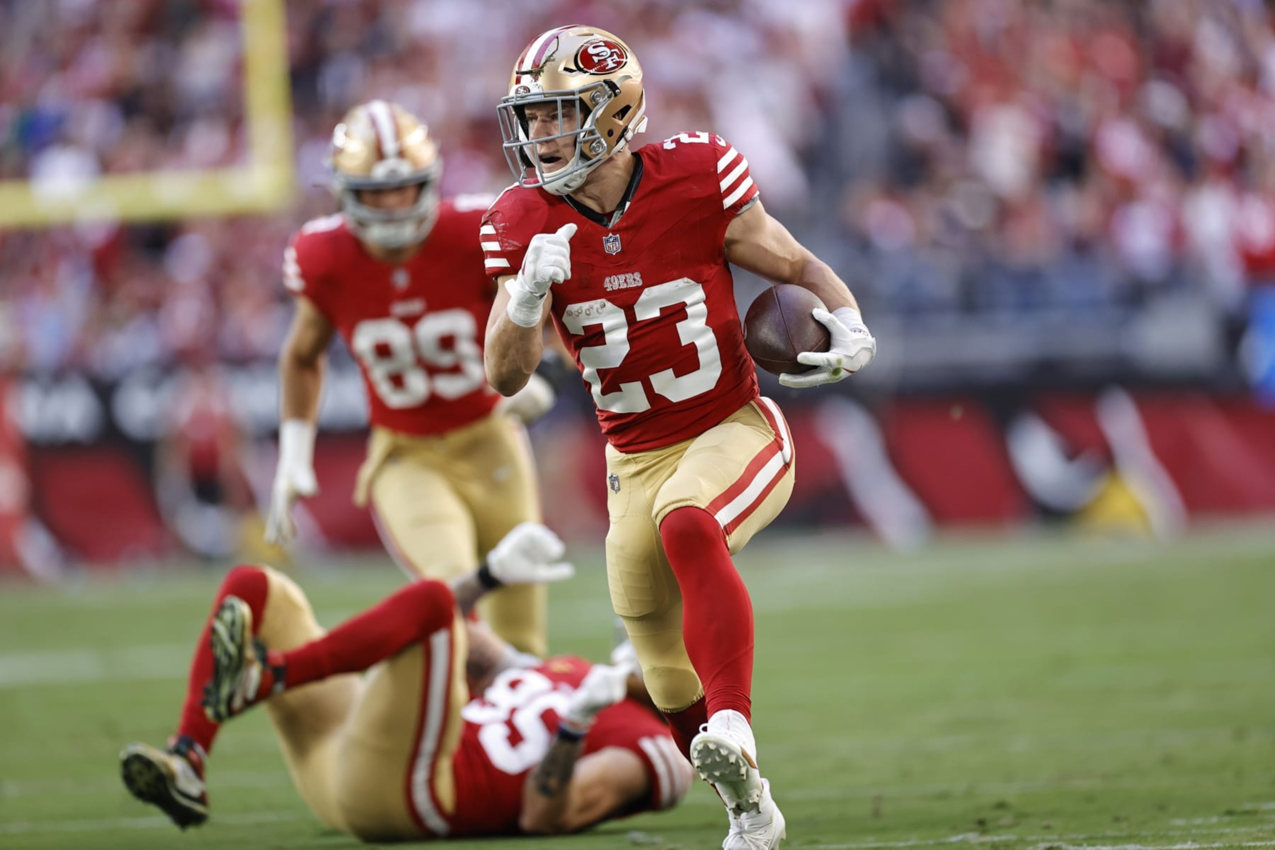 GLENDALE, AZ - DECEMBER 17: Christian McCaffrey #23 of the San Francisco 49ers rushes during the game against the Arizona Cardinals at State Farm Stadium on December 17, 2023 in Glendale, Arizona. The 49ers defeated the Cardinals 45-29. (Photo by Michael Zagaris/San Francisco 49ers/Getty Images) GLENDALE, AZ - DECEMBER 17: Christian McCaffrey #23 of the San Francisco 49ers rushes during the game against the Arizona Cardinals at State Farm Stadium on December 17, 2023 in Glendale, Arizona. The 49ers defeated the Cardinals 45-29. (Photo by Michael Zagaris/San Francisco 49ers/Getty Images)
