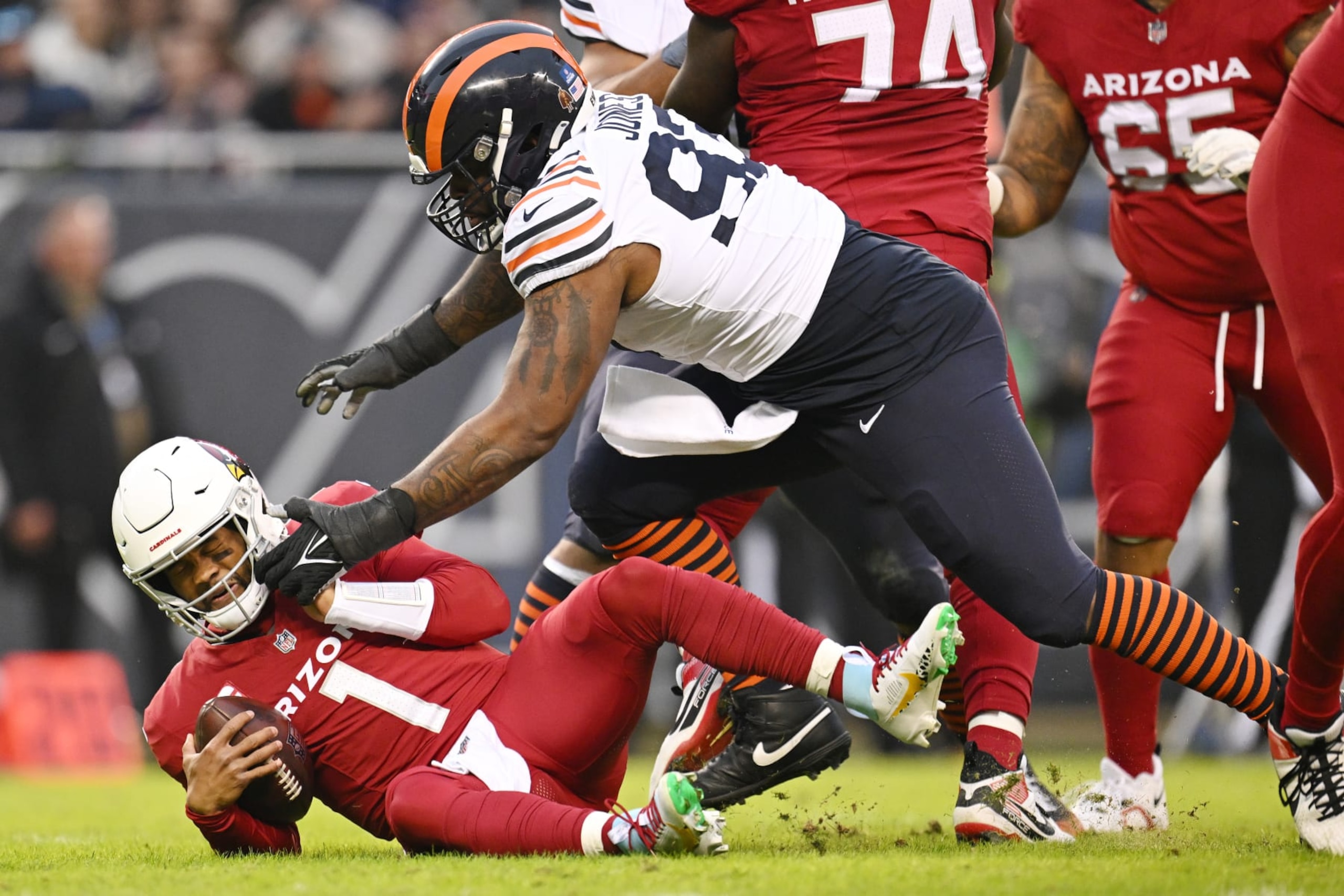 CHICAGO, ILLINOIS - DECEMBER 24: Justin Jones #93 of the Chicago Bears sacks Kyler Murray #1 of the Arizona Cardinals during the first quarter at Soldier Field on December 24, 2023 in Chicago, Illinois. (Photo by Quinn Harris/Getty Images) CHICAGO, ILLINOIS - DECEMBER 24: Justin Jones #93 of the Chicago Bears sacks Kyler Murray #1 of the Arizona Cardinals during the first quarter at Soldier Field on December 24, 2023 in Chicago, Illinois. (Photo by Quinn Harris/Getty Images)