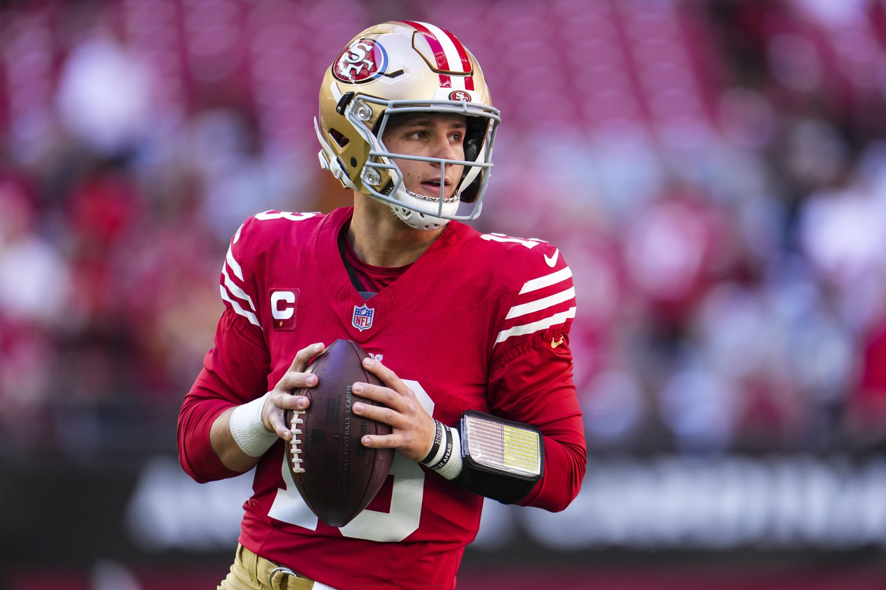 GLENDALE, AZ - DECEMBER 17: Brock Purdy #13 of the San Francisco 49ers warms up prior to an NFL football game against the Arizona Cardinals at State Farm Stadium on December 17, 2023 in Glendale, Arizona. (Photo by Cooper Neill/Getty Images)