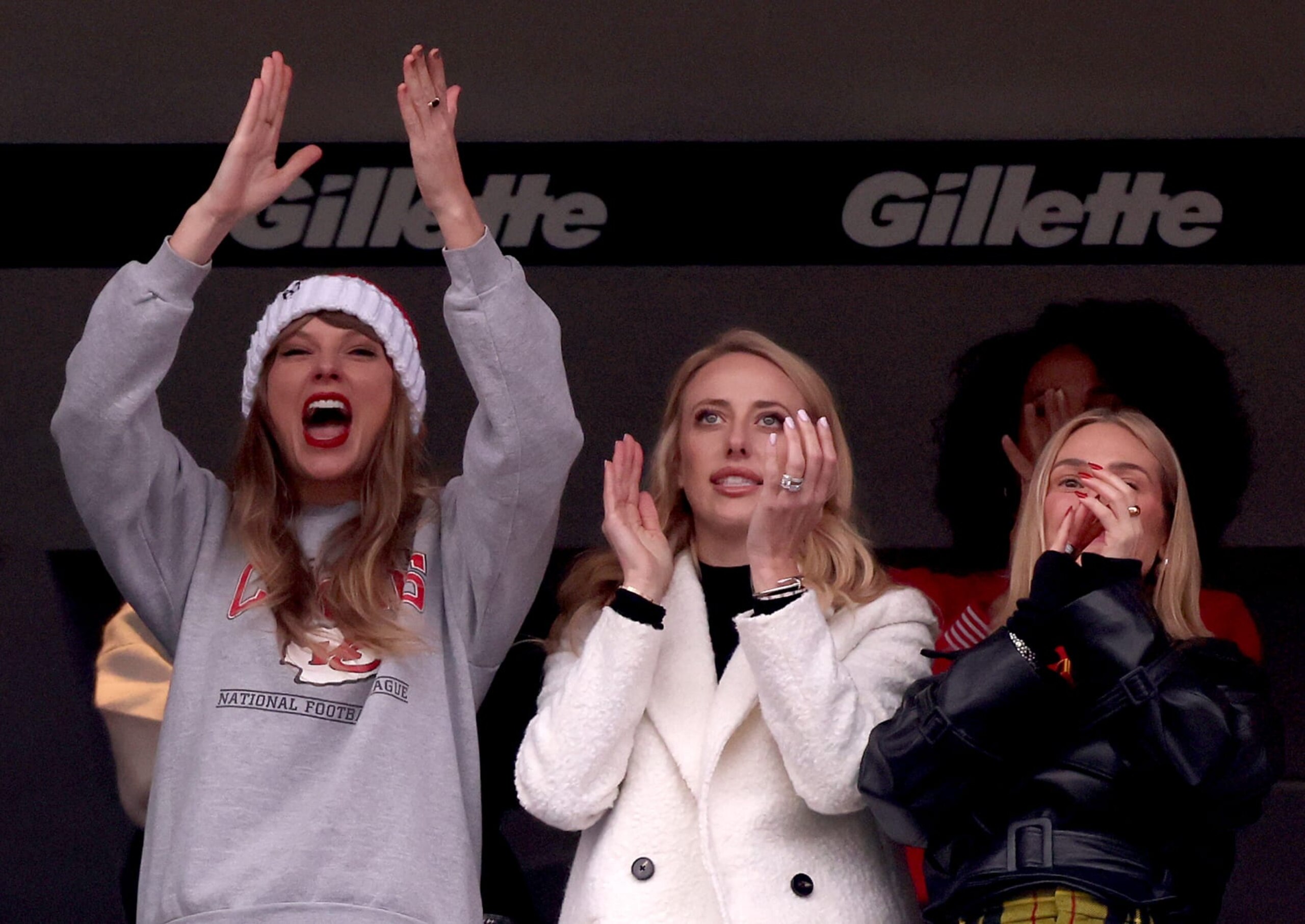 FOXBOROUGH, MASSACHUSETTS - DECEMBER 17: Taylor Swift, Brittany Mahomes, and Ashley Avignone cheer after a Kansas City Chiefs touchdown during the second quarter against the New England Patriots at Gillette Stadium on December 17, 2023 in Foxborough, Massachusetts. (Photo by Maddie Meyer/Getty Images)