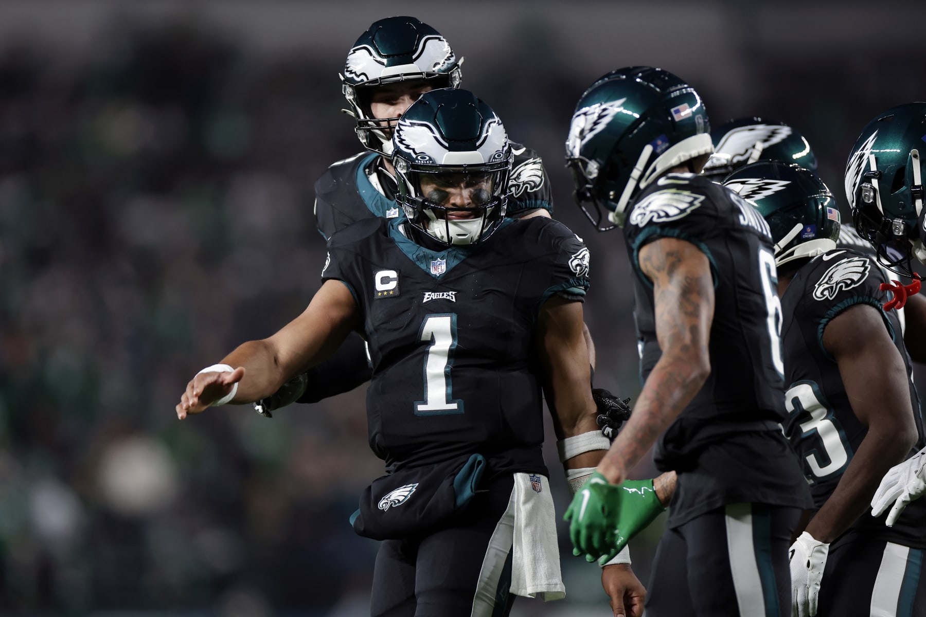 PHILADELPHIA, PENNSYLVANIA - DECEMBER 25: Jalen Hurts #1 and DeVonta Smith #6 of the Philadelphia Eagles celebrate a touchdown during the second quarter against the New York Giants at Lincoln Financial Field on December 25, 2023 in Philadelphia, Pennsylvania. (Photo by Adam Hunger/Getty Images)