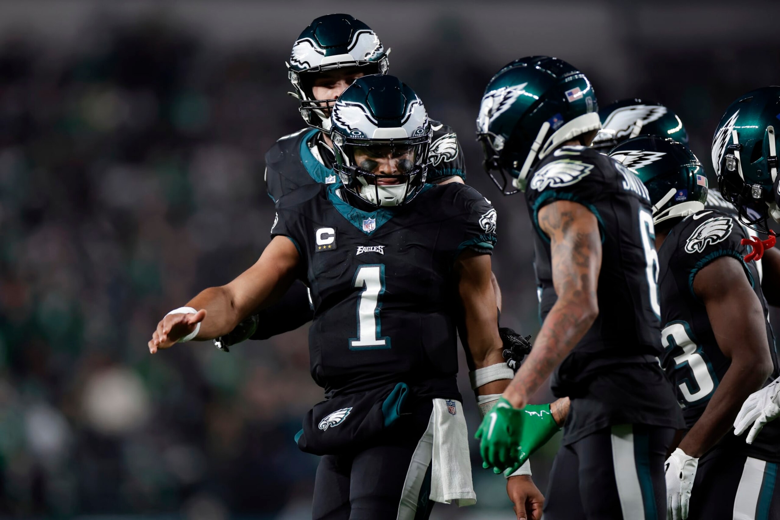 PHILADELPHIA, PENNSYLVANIA - DECEMBER 25: Jalen Hurts #1 and DeVonta Smith #6 of the Philadelphia Eagles celebrate a touchdown during the second quarter against the New York Giants at Lincoln Financial Field on December 25, 2023 in Philadelphia, Pennsylvania. (Photo by Adam Hunger/Getty Images)