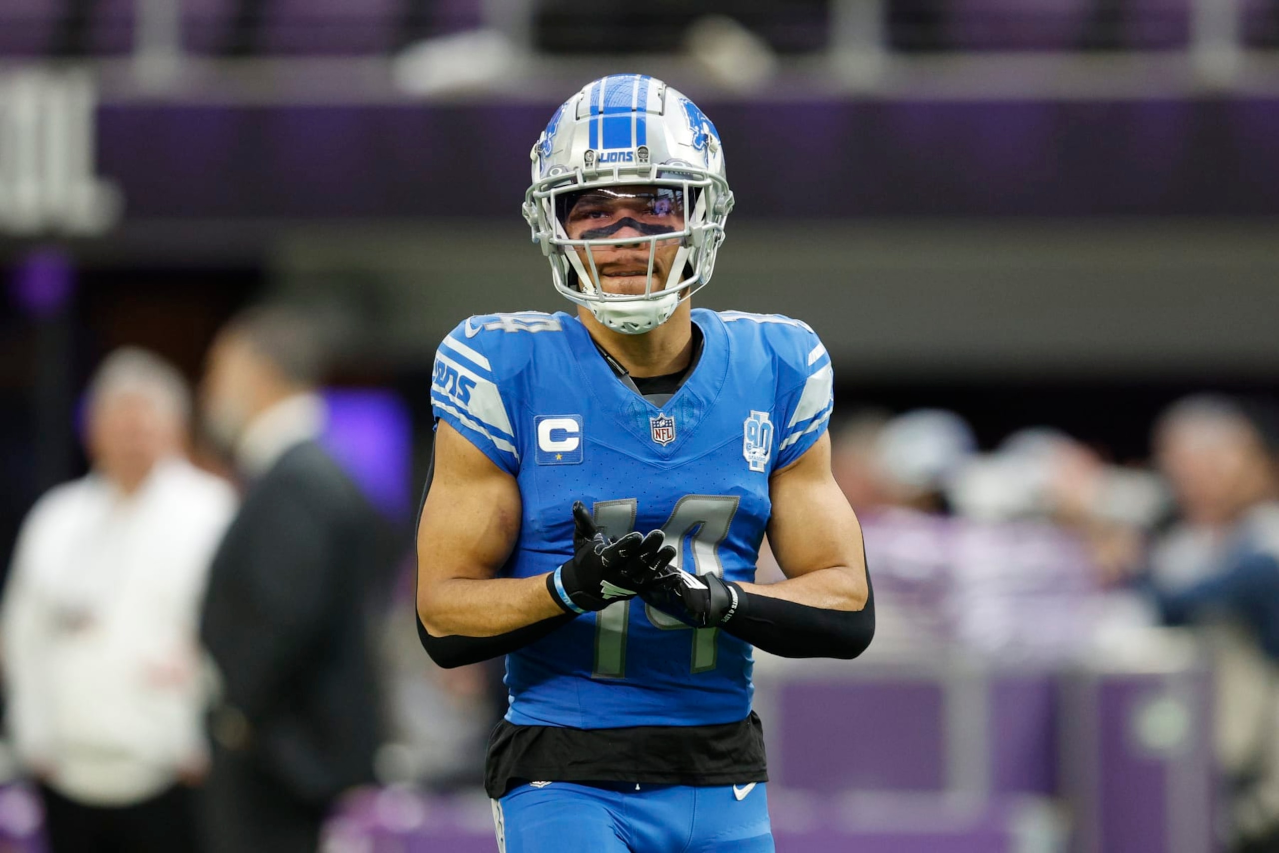 MINNEAPOLIS, MINNESOTA - DECEMBER 24:  Amon-Ra St. Brown #14 of the Detroit Lions warms up prior to the game against the Minnesota Vikings at U.S. Bank Stadium on December 24, 2023 in Minneapolis, Minnesota. (Photo by David Berding/Getty Images)
