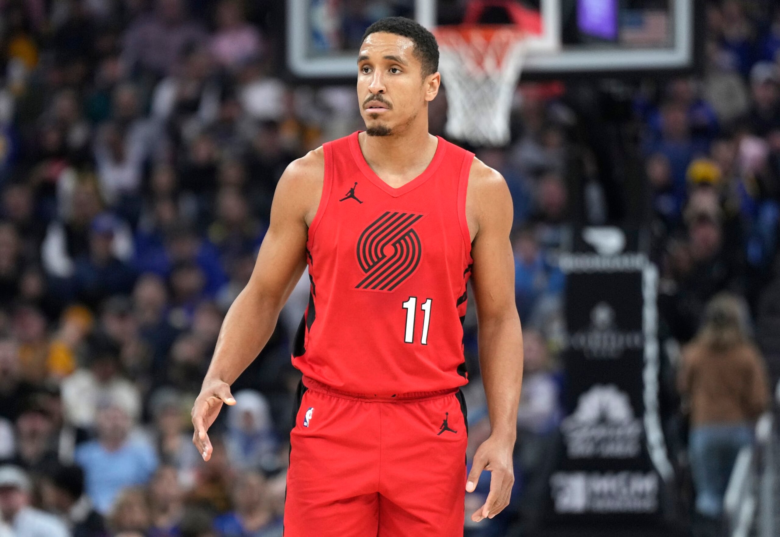 SAN FRANCISCO, CALIFORNIA - DECEMBER 23: Malcolm Brogdon #11 of the Portland Trail Blazers looks on against the Golden State Warriors during the first half of an NBA basketball game at Chase Center on December 23, 2023 in San Francisco, California. NOTE TO USER: User expressly acknowledges and agrees that, by downloading and or using this photograph, User is consenting to the terms and conditions of the Getty Images License Agreement. (Photo by Thearon W. Henderson/Getty Images)