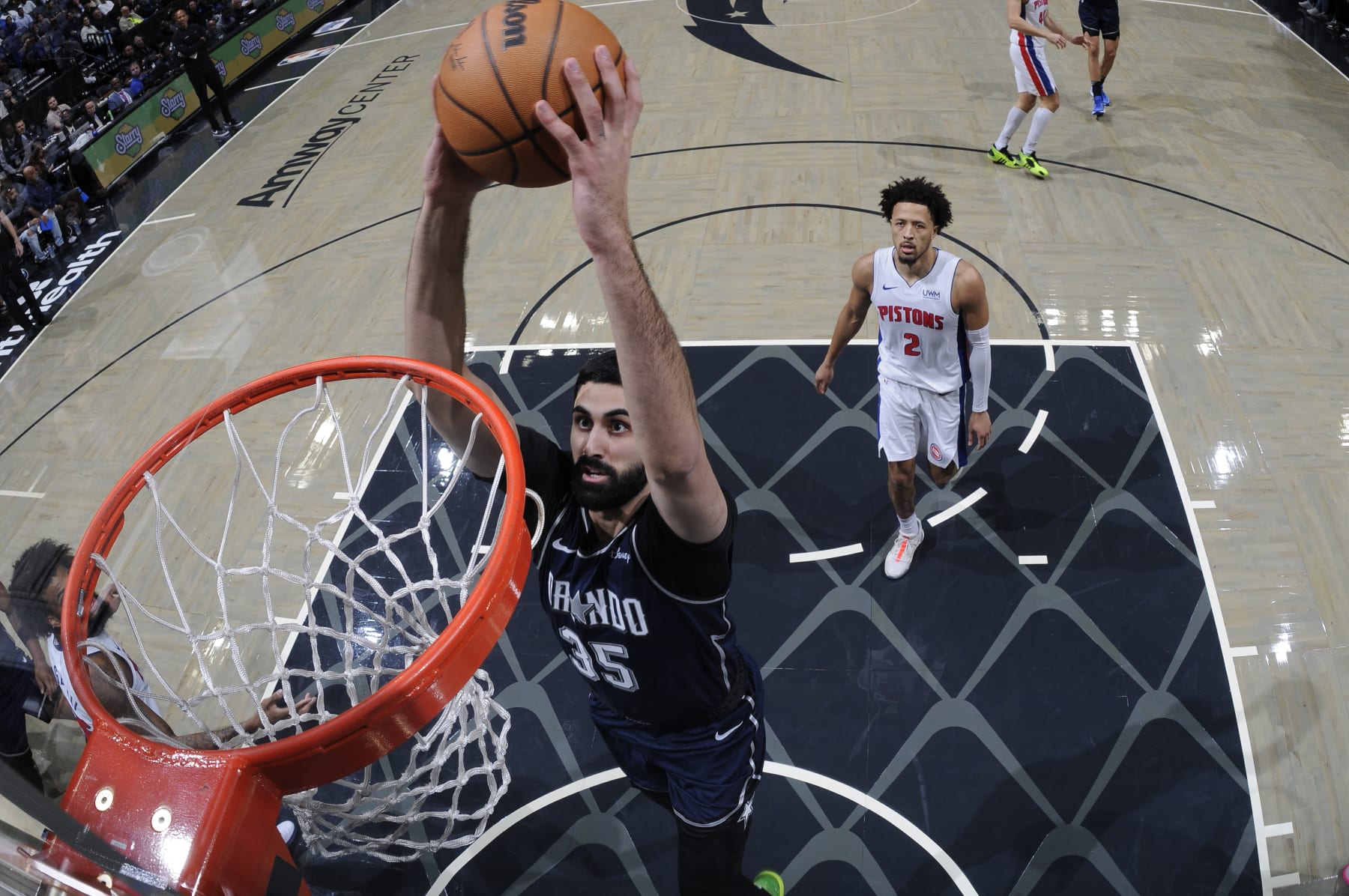 ORLANDO, FL - DECEMBER 8: Goga Bitadze #35 of the Orlando Magic dunks the ball during the game against the Detroit Pistons on December 8, 2023 at Amway Center in Orlando, Florida. NOTE TO USER: User expressly acknowledges and agrees that, by downloading and or using this photograph, User is consenting to the terms and conditions of the Getty Images License Agreement. Mandatory Copyright Notice: Copyright 2023 NBAE (Photo by Fernando Medina/NBAE via Getty Images)