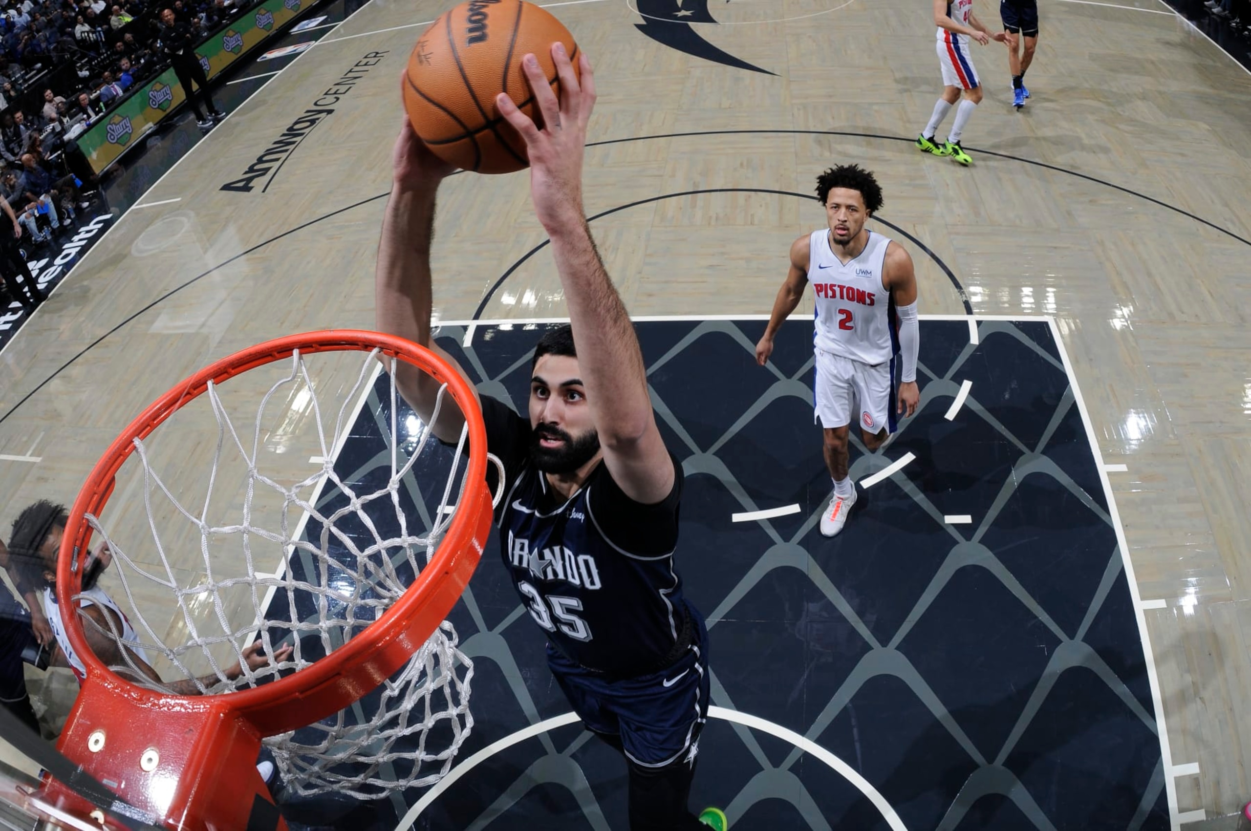 ORLANDO, FL - DECEMBER 8: Goga Bitadze #35 of the Orlando Magic dunks the ball during the game against the Detroit Pistons on December 8, 2023 at Amway Center in Orlando, Florida. NOTE TO USER: User expressly acknowledges and agrees that, by downloading and or using this photograph, User is consenting to the terms and conditions of the Getty Images License Agreement. Mandatory Copyright Notice: Copyright 2023 NBAE (Photo by Fernando Medina/NBAE via Getty Images)