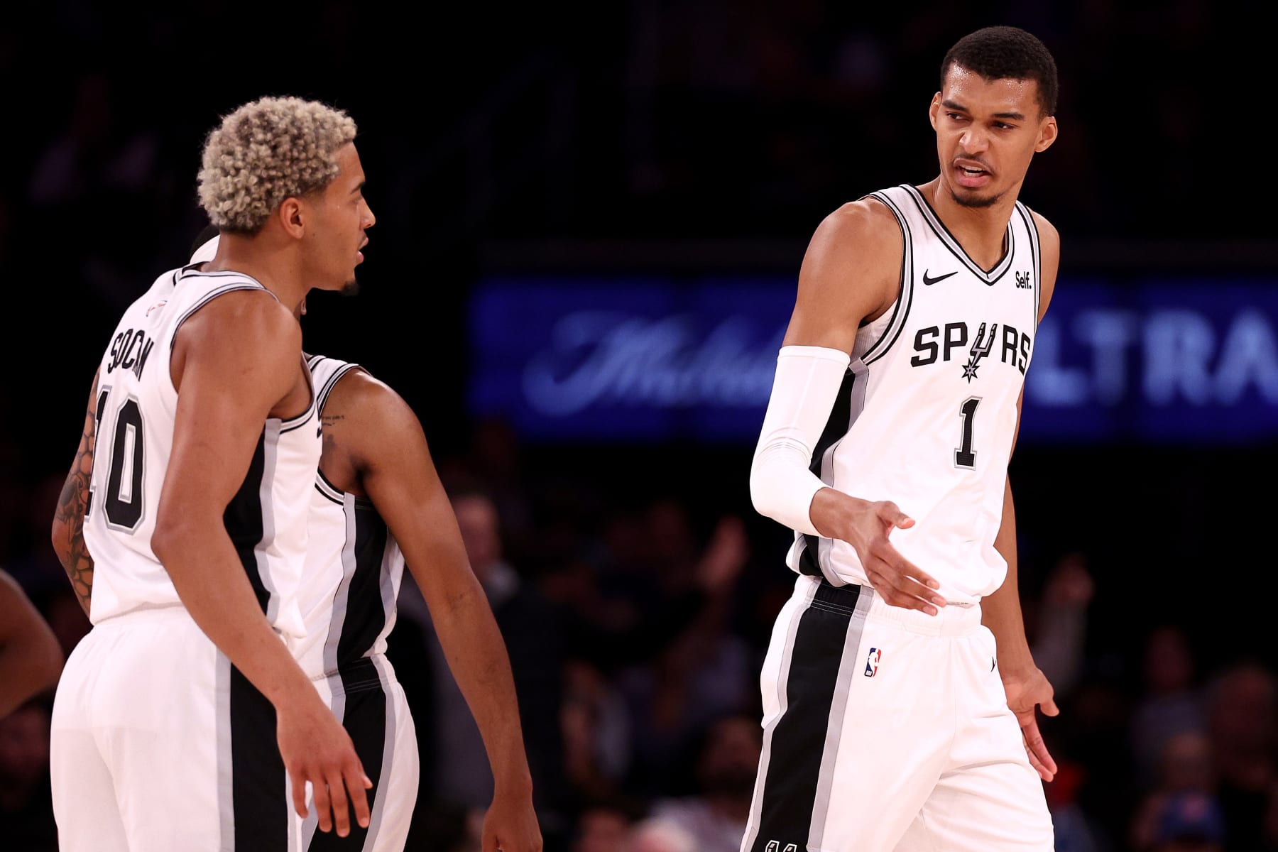 NEW YORK, NEW YORK - NOVEMBER 08: Victor Wembanyama #1 and Jeremy Sochan #10 of the San Antonio Spurs react against the New York Knicks during the fourth quarter in the game at Madison Square Garden on November 08, 2023 in New York City. NOTE TO USER: User expressly acknowledges and agrees that, by downloading and or using this photograph, User is consenting to the terms and conditions of the Getty Images License Agreement. (Photo by Elsa/Getty Images)