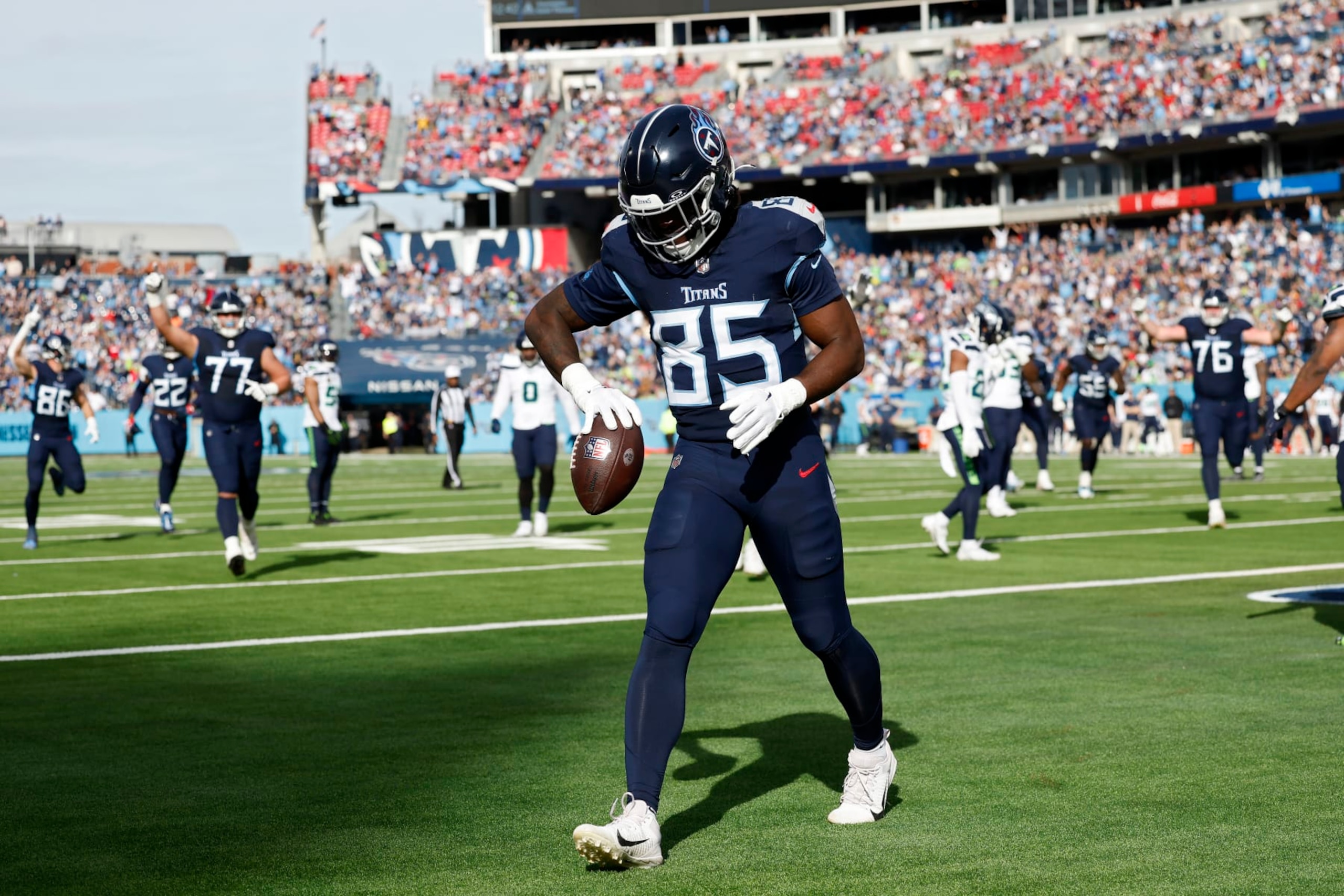 NASHVILLE, TENNESSEE - DECEMBER 24: Chigoziem Okonkwo #85 of the Tennessee Titans celebrates after a touchdown during the second quarter in the game against the Seattle Seahawks at Nissan Stadium on December 24, 2023 in Nashville, Tennessee. (Photo by Wesley Hitt/Getty Images)