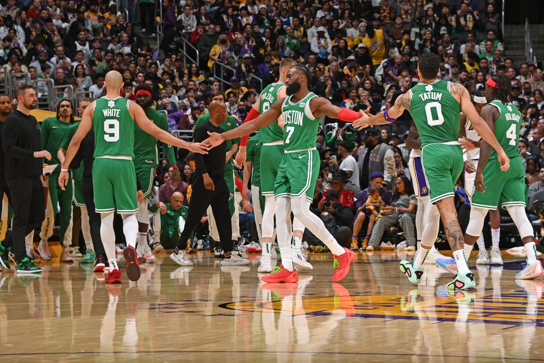 Derrick White, Kristaps PorziÅÄ£is, Jaylen Brown, Jayson Tatum and Jrue Holiday