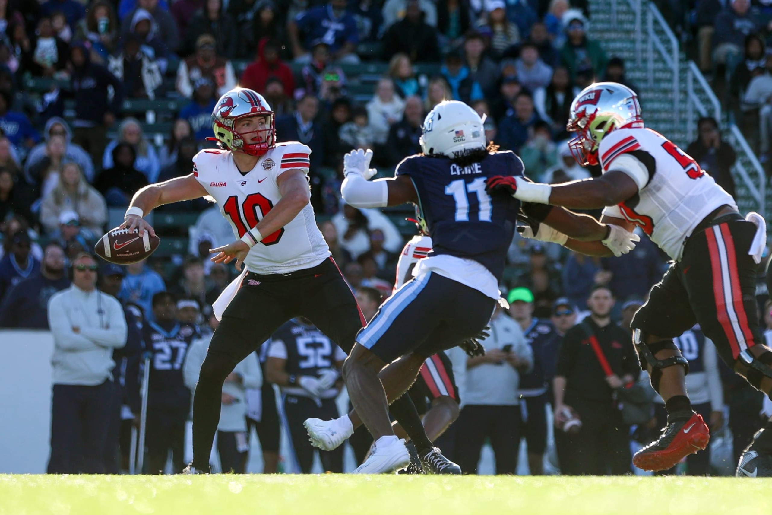 CHARLOTTE, NORTH CAROLINA - DECEMBER 18: Caden Veltkamp #10 of the Western Kentucky Hilltoppers throws the ball against the Old Dominion Monarchs during the first half of the Famous Toastery Bowl at Jerry Richardson Stadium on December 18, 2023 in Charlotte, North Carolina. (Photo by Isaiah Vazquez/Getty Images) CHARLOTTE, NORTH CAROLINA - DECEMBER 18: Caden Veltkamp #10 of the Western Kentucky Hilltoppers throws the ball against the Old Dominion Monarchs during the first half of the Famous Toastery Bowl at Jerry Richardson Stadium on December 18, 2023 in Charlotte, North Carolina. (Photo by Isaiah Vazquez/Getty Images)
