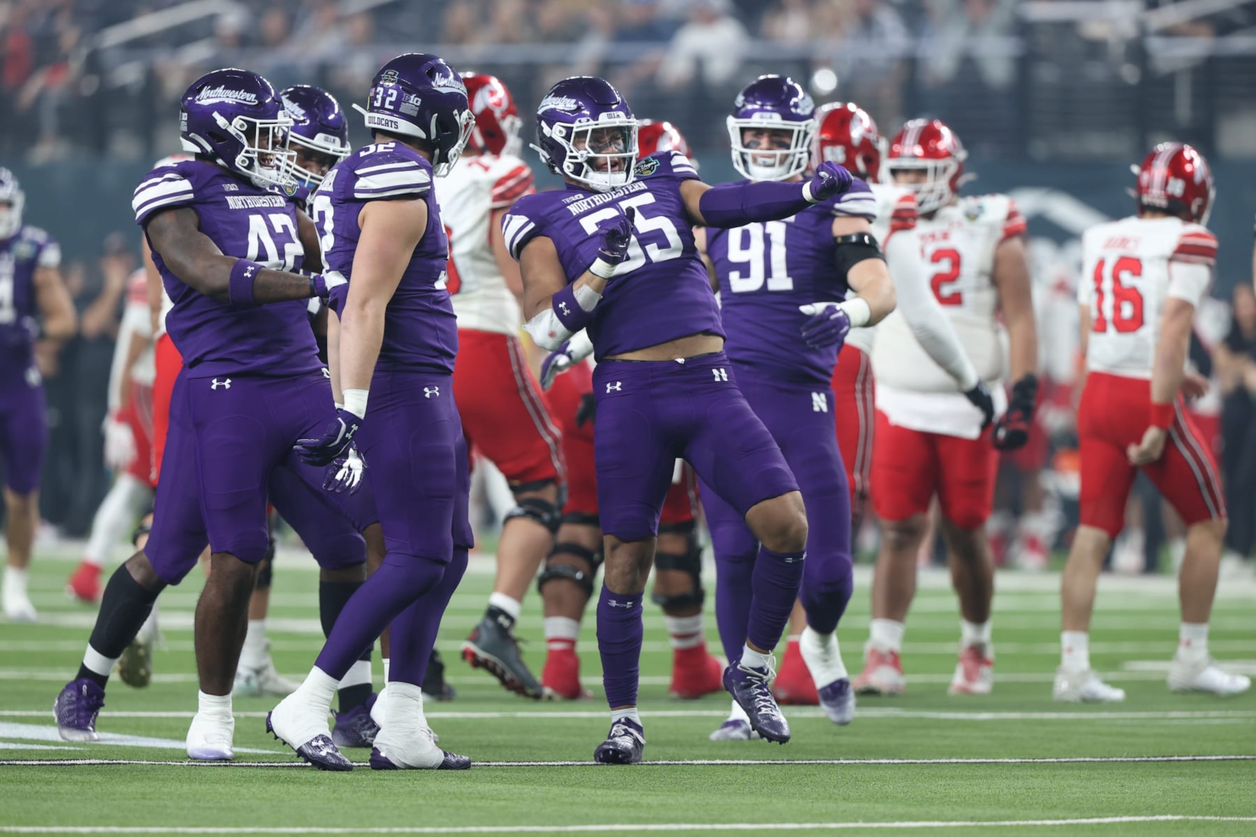 LAS VEGAS, NEVADA - DECEMBER 23: Linebacker Kenny Soares Jr #35 of the Northwestern Wildcats celebrates with teammates after making a tackle during the SRS Distribution Las Vegas Bowl between the Utah Utes and Northwestern Wildcats at Allegiant Stadium on December 23, 2023 in Las Vegas, Nevada. (Photo by Zak Krill/Getty Images) LAS VEGAS, NEVADA - DECEMBER 23: Linebacker Kenny Soares Jr #35 of the Northwestern Wildcats celebrates with teammates after making a tackle during the SRS Distribution Las Vegas Bowl between the Utah Utes and Northwestern Wildcats at Allegiant Stadium on December 23, 2023 in Las Vegas, Nevada. (Photo by Zak Krill/Getty Images)