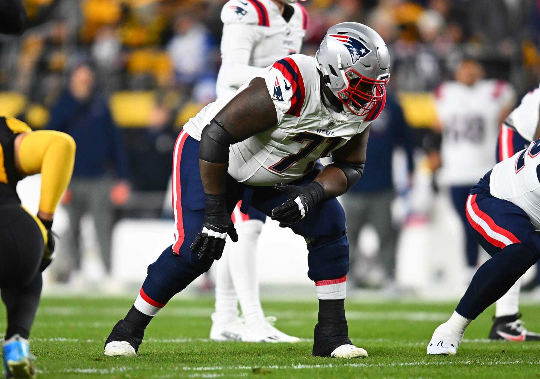 PITTSBURGH, PENNSYLVANIA - DECEMBER 7:  Mike Onwenu #71 of the New England Patriots in action during the game against the Pittsburgh Steelers at Acrisure Stadium on December 7, 2023 in Pittsburgh, Pennsylvania. (Photo by Joe Sargent/Getty Images)