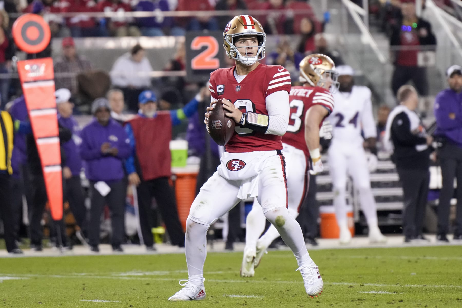SANTA CLARA, CALIFORNIA - DECEMBER 25: Brock Purdy #13 of the San Francisco 49ers attempts a pass during the second quarter against the Baltimore Ravens at Levi's Stadium on December 25, 2023 in Santa Clara, California. (Photo by Loren Elliott/Getty Images)