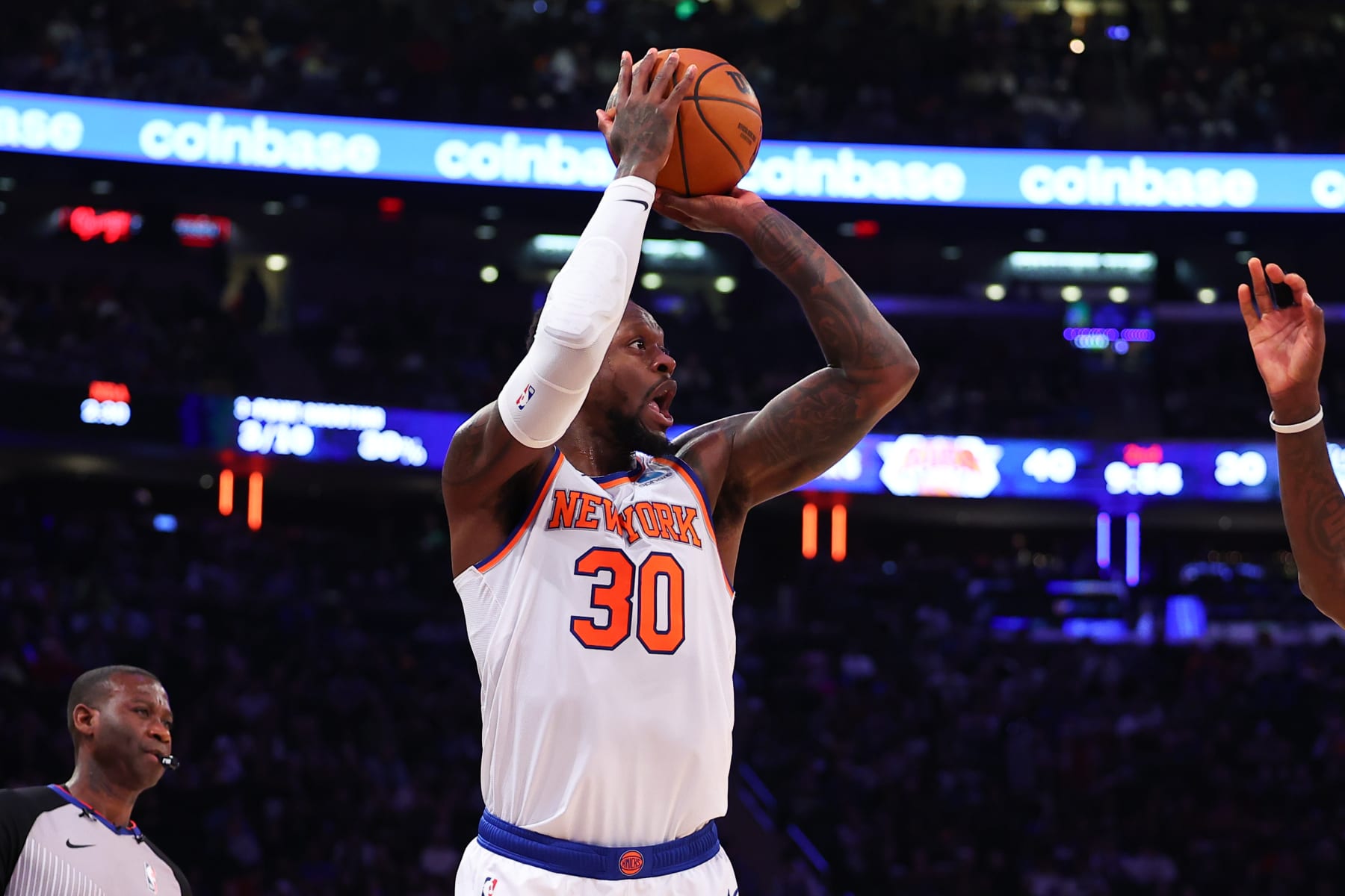 NEW YORK, NEW YORK - DECEMBER 25:  Julius Randle #30 of the New York Knicks shoots the ball during the first quarter against the Milwaukee Bucks at Madison Square Garden on December 25, 2023 in New York City.  NOTE TO USER: User expressly acknowledges and agrees that, by downloading and or using this photograph, User is consenting to the terms and conditions of the Getty Images License Agreement. (Photo by Rich Graessle/Getty Images)