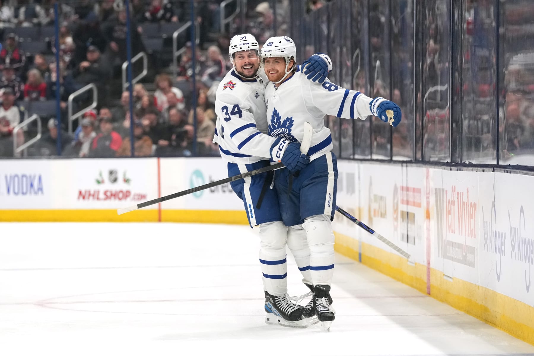 COLUMBUS, OHIO - DECEMBER 23: William Nylander #88 and Auston Matthews #34 of the Toronto Maple Leafs celebrate a goal in the third period against the Columbus Blue Jackets at Nationwide Arena on December 23, 2023 in Columbus, Ohio. (Photo by Jason Mowry/Getty Images)