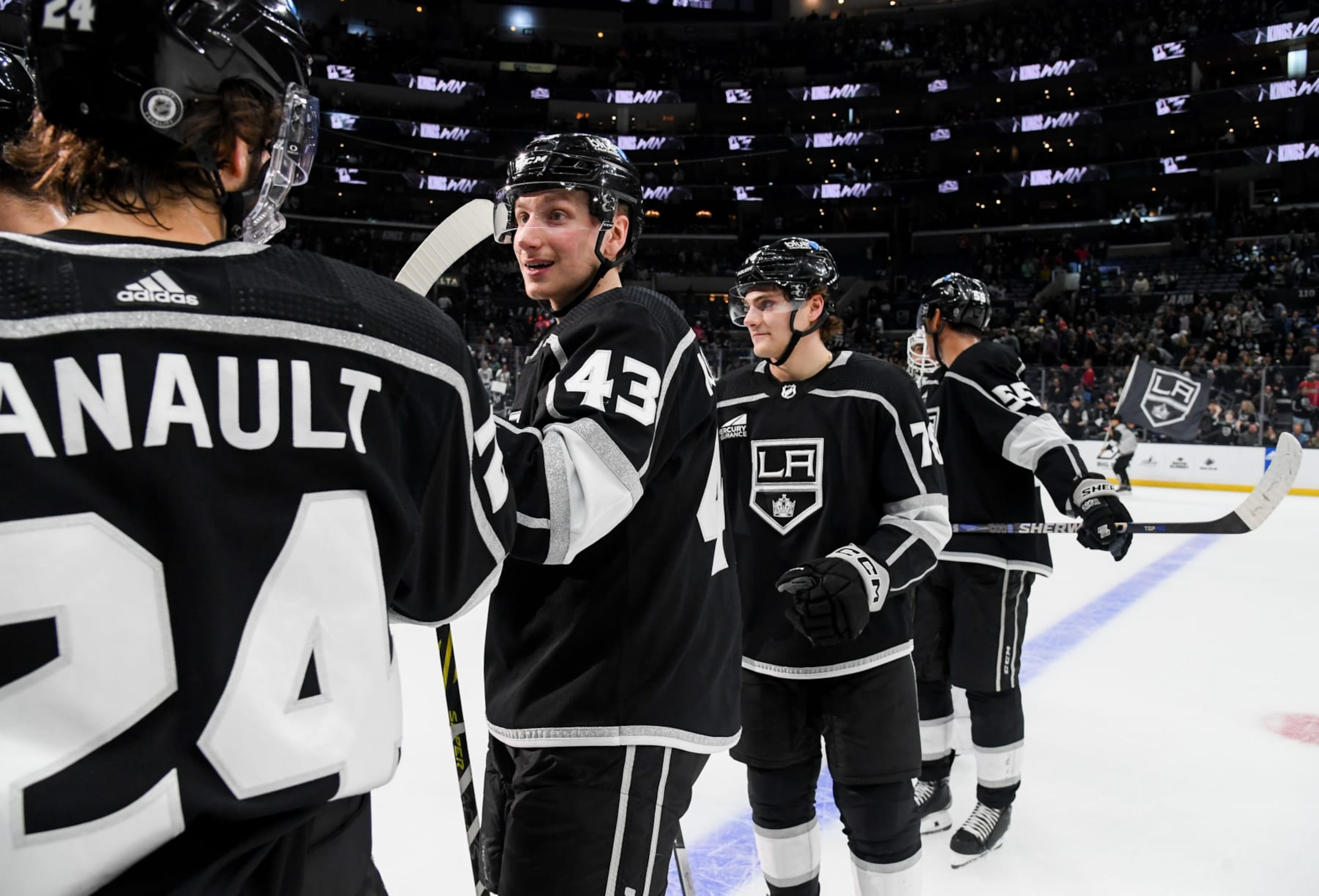LOS ANGELES, CA - DECEMBER 23: Phillip Danault #24 of the Los Angeles Kings and Jacob Moverare #43 celebrate their victory against the Calgary Flames at Crypto.com Arena on December 23, 2023 in Los Angeles, California. (Photo by Juan Ocampo/NHLI via Getty Images) LOS ANGELES, CA - DECEMBER 23: Phillip Danault #24 of the Los Angeles Kings and Jacob Moverare #43 celebrate their victory against the Calgary Flames at Crypto.com Arena on December 23, 2023 in Los Angeles, California. (Photo by Juan Ocampo/NHLI via Getty Images)