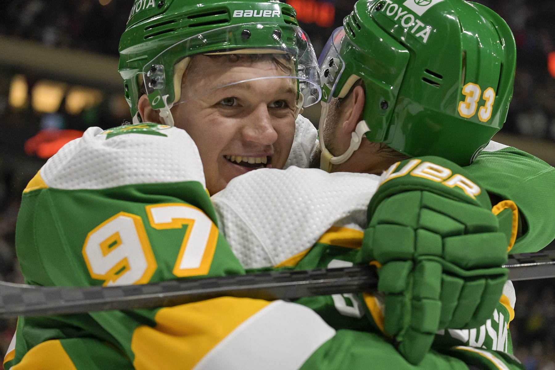 ST. PAUL, MN - DECEMBER 23:  Minnesota Wild Left Wing Kirill Kaprizov (97) celebrates his goal with Minnesota Wild Defenceman Alex Goligoski (33) who assisted on the play during the second period of an NHL game between the Minnesota Wild and Boston Bruins on December 23, 2023, at Xcel Energy Center in St. Paul, MN.(Photo by Nick Wosika/Icon Sportswire via Getty Images)