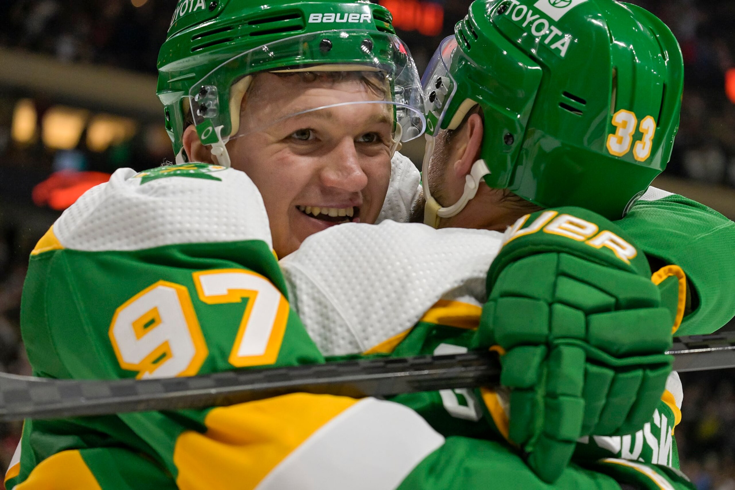 ST. PAUL, MN - DECEMBER 23:  Minnesota Wild Left Wing Kirill Kaprizov (97) celebrates his goal with Minnesota Wild Defenceman Alex Goligoski (33) who assisted on the play during the second period of an NHL game between the Minnesota Wild and Boston Bruins on December 23, 2023, at Xcel Energy Center in St. Paul, MN.(Photo by Nick Wosika/Icon Sportswire via Getty Images)