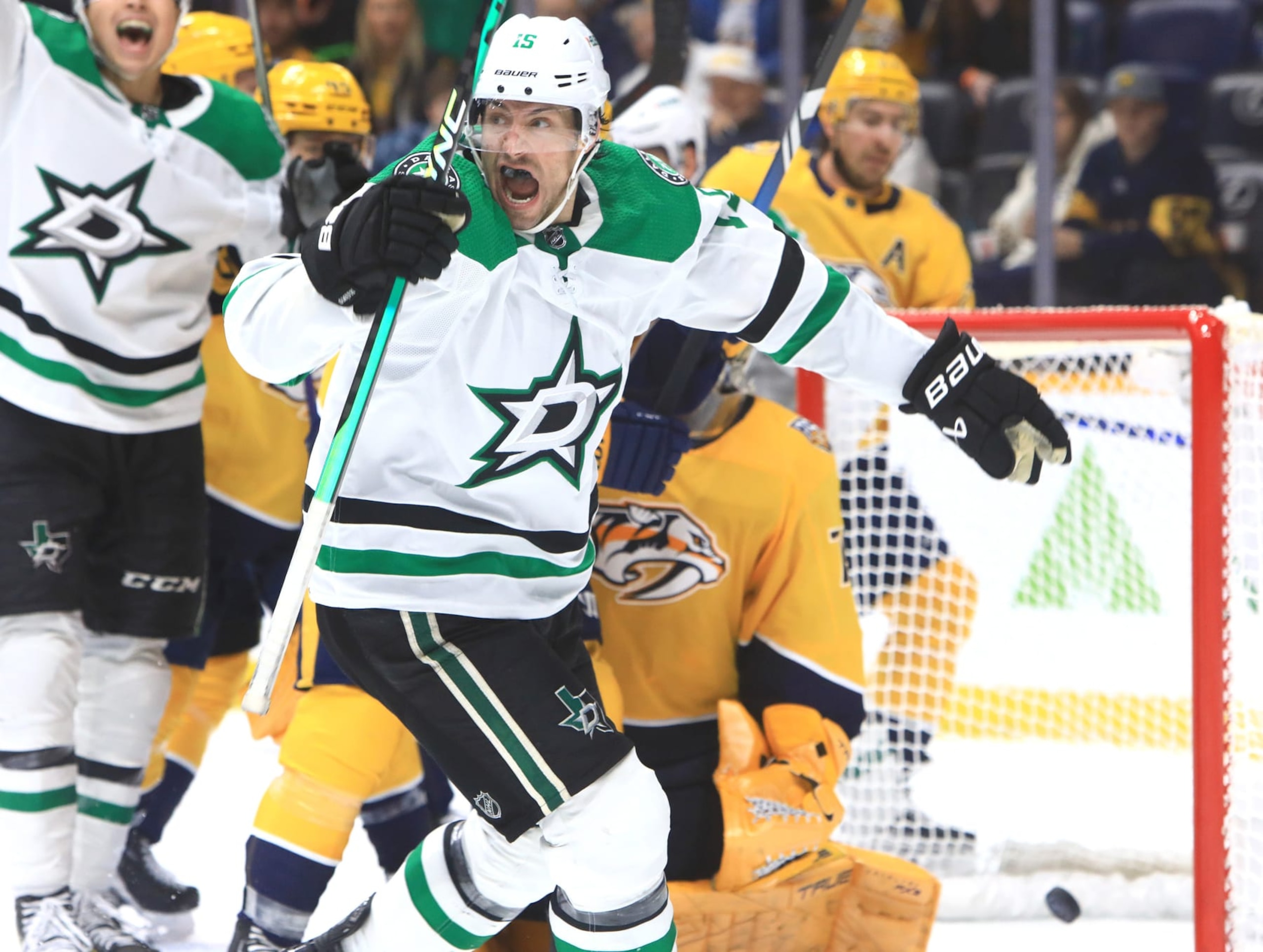 NASHVILLE, TN - DECEMBER 23: Dallas Stars right wing Craig Smith (15) celebrates his game-tying goal during the NHL game between the Nashville Predators and Dallas Stars, held on December 23, 2023, at Bridgestone Arena in Nashville, Tennessee. (Photo by Danny Murphy/Icon Sportswire via Getty Images)