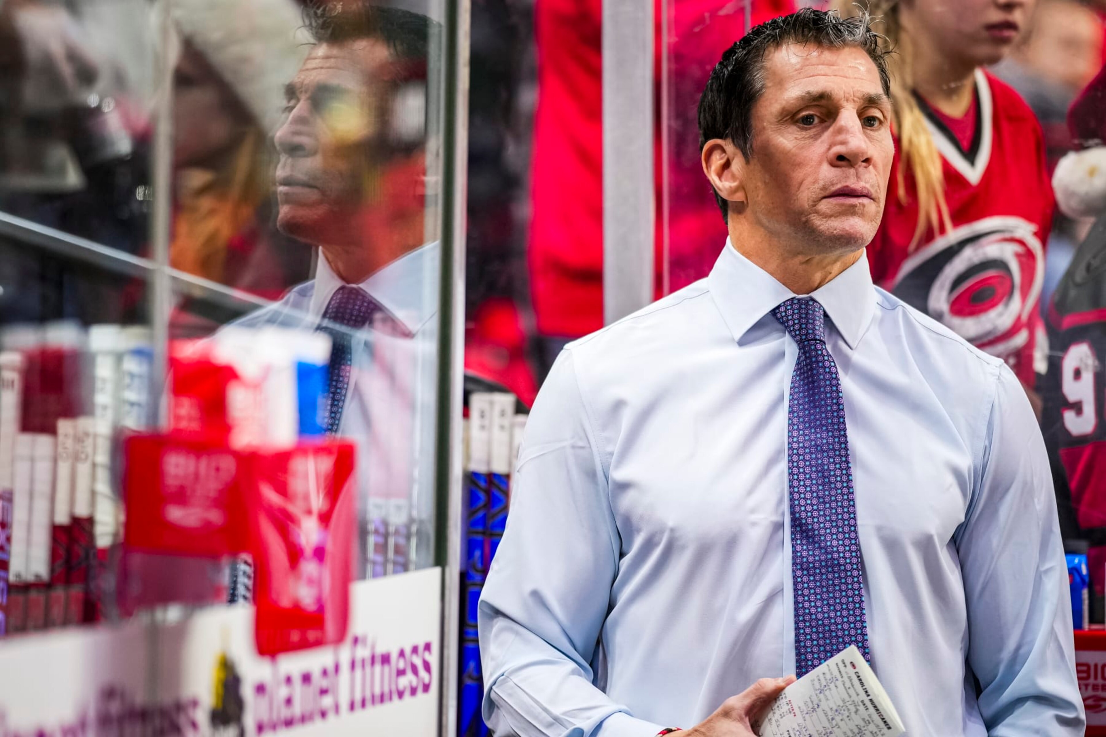 RALEIGH, NORTH CAROLINA - DECEMBER 15: Rod Brind'Amour of the Carolina Hurricanes looks on during warmups prior to an NHL hockey game between the Nashville Predators and the Carolina Hurricanes at PNC Arena on December 15, 2023 in Raleigh, North Carolina. (Photo by (Josh Lavallee/NHLI via Getty Images) RALEIGH, NORTH CAROLINA - DECEMBER 15: Rod Brind'Amour of the Carolina Hurricanes looks on during warmups prior to an NHL hockey game between the Nashville Predators and the Carolina Hurricanes at PNC Arena on December 15, 2023 in Raleigh, North Carolina. (Photo by (Josh Lavallee/NHLI via Getty Images)