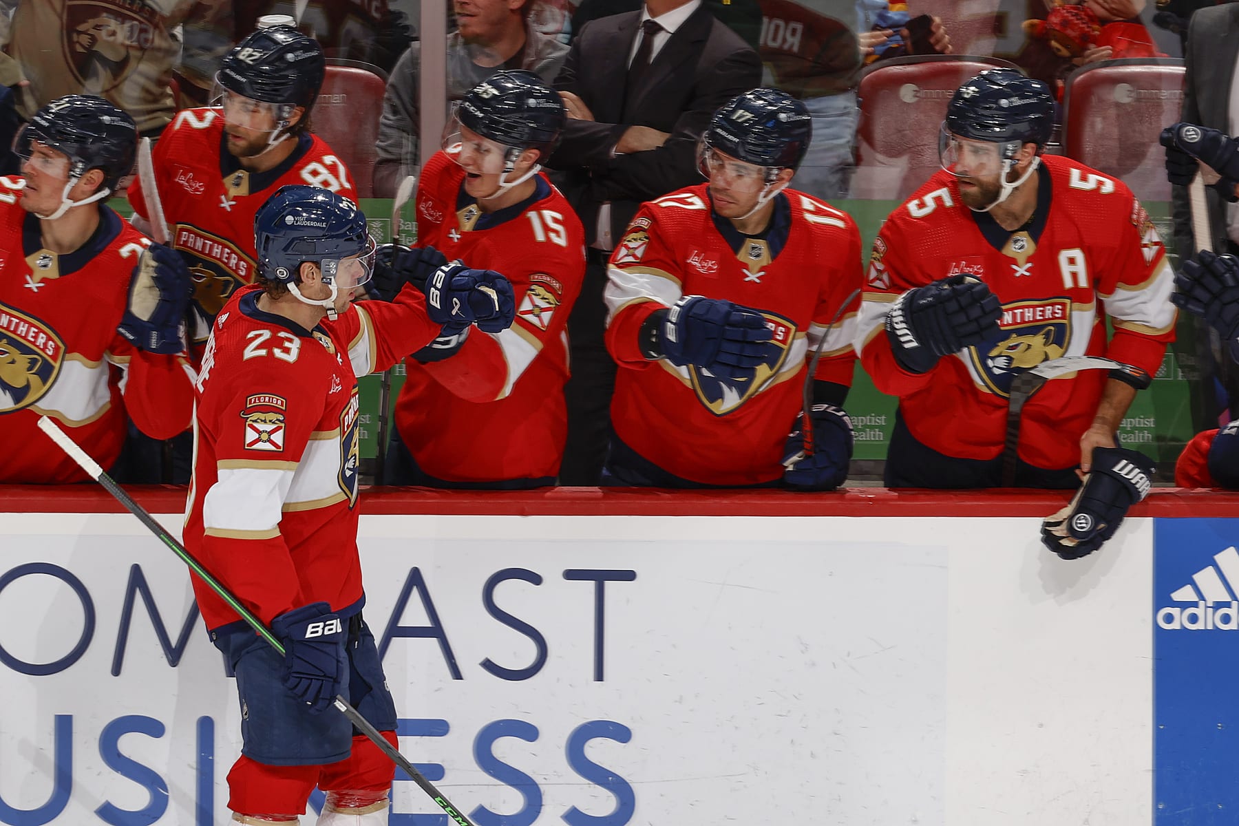 SUNRISE, FL - DECEMBER 23: Carter Verhaeghe #23 of the Florida Panthers celebrates with teammates on the bench after he scored a goal in the third period against the Vegas Golden Knights at the Amerant Bank Arena on December 23, 2023 in Sunrise, Florida. (Photo by Joel Auerbach/Getty Images)