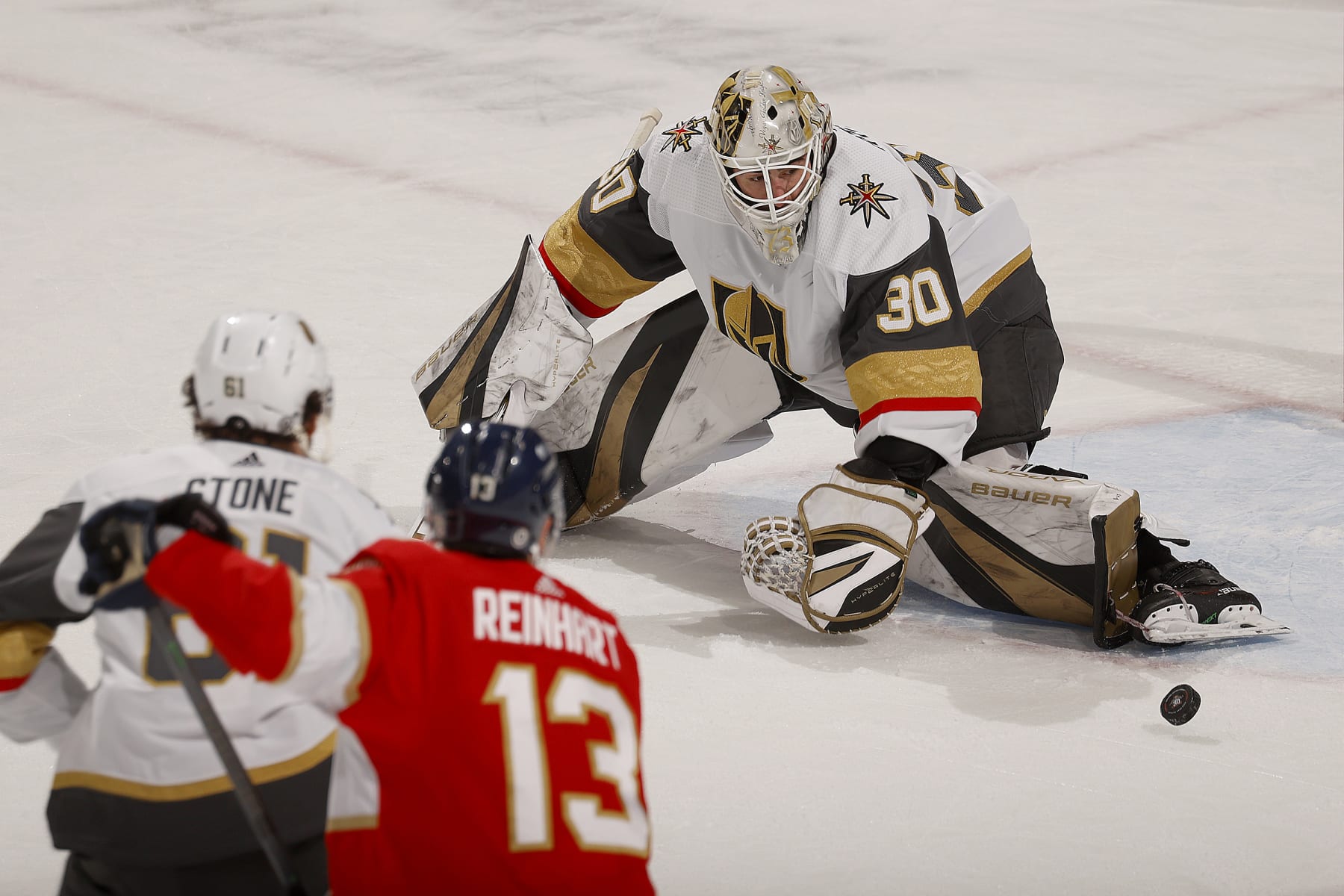 SUNRISE, FLORIDA - DECEMBER 23: Goaltender Jiri Patera #30 of the Vegas Golden Knights keeps an eye on the puck while defends the net during the second period against the Florida Panthers at the Amerant Bank Arena on December 23, 2023 in Sunrise, Florida. (Photo by Eliot J. Schechter/NHLI via Getty Images)