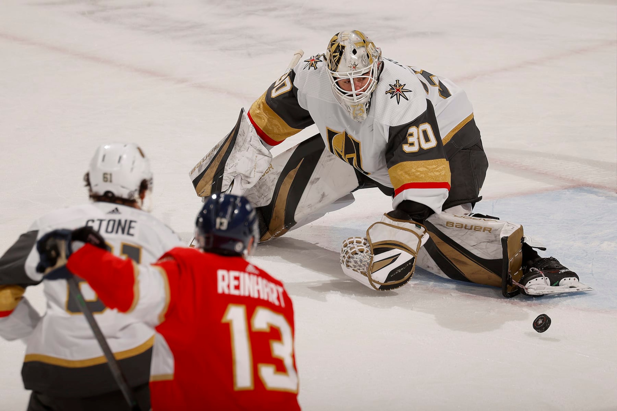 SUNRISE, FLORIDA - DECEMBER 23: Goaltender Jiri Patera #30 of the Vegas Golden Knights keeps an eye on the puck while defends the net during the second period against the Florida Panthers at the Amerant Bank Arena on December 23, 2023 in Sunrise, Florida. (Photo by Eliot J. Schechter/NHLI via Getty Images)