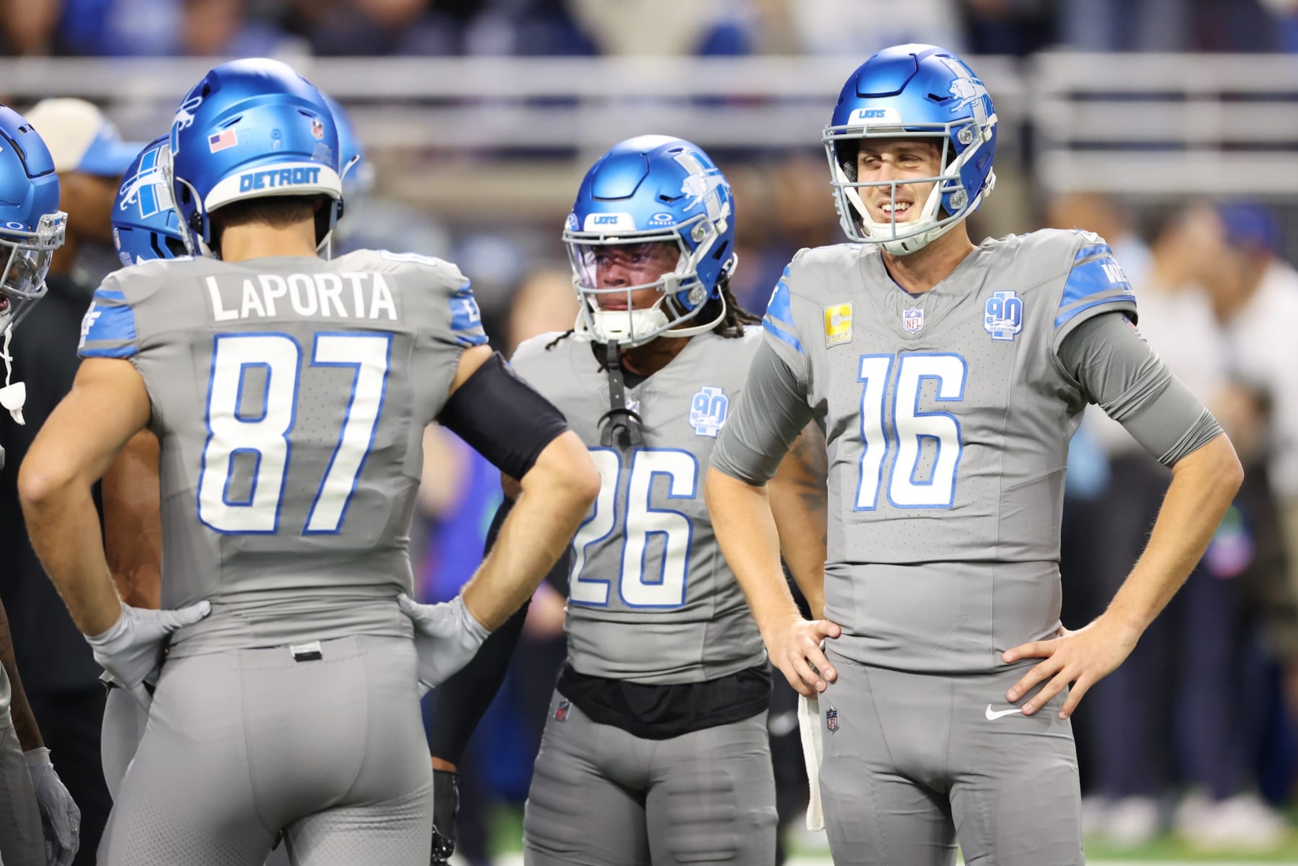 DETROIT, MICHIGAN - OCTOBER 30: Sam LaPorta #87, Jahmyr Gibbs #26 and Jared Goff #16 of the Detroit Lions warm up prior to their game against the Las Vegas Raiders at Ford Field on October 30, 2023 in Detroit, Michigan. (Photo by Gregory Shamus/Getty Images)
