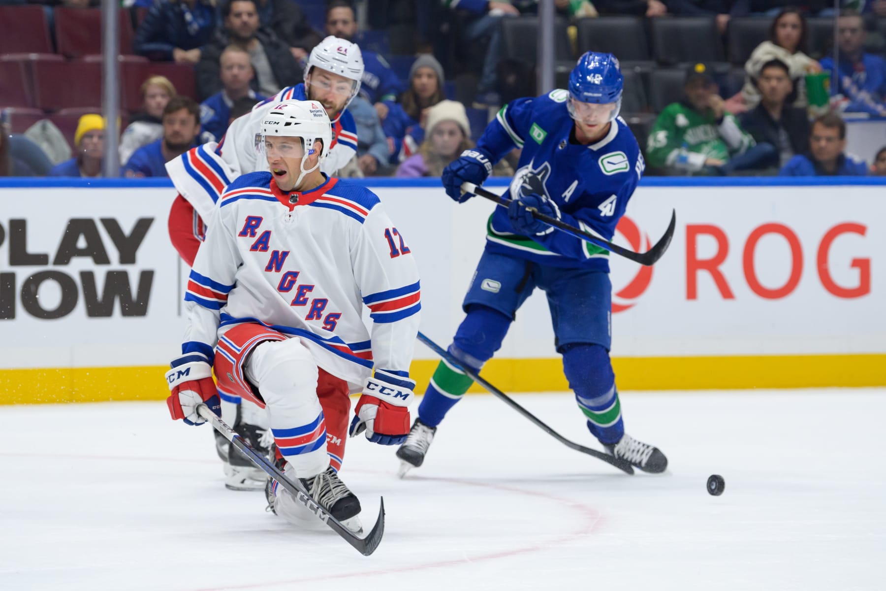 VANCOUVER, CANADA - OCTOBER 28: Nick Bonino #12 of the New York Rangers blocks a shot by Elias Pettersson #40 of the Vancouver Canucks during the first period of their NHL game at Rogers Arena on October 28, 2023 in Vancouver, British Columbia, Canada. (Photo by Derek Cain/Getty Images)