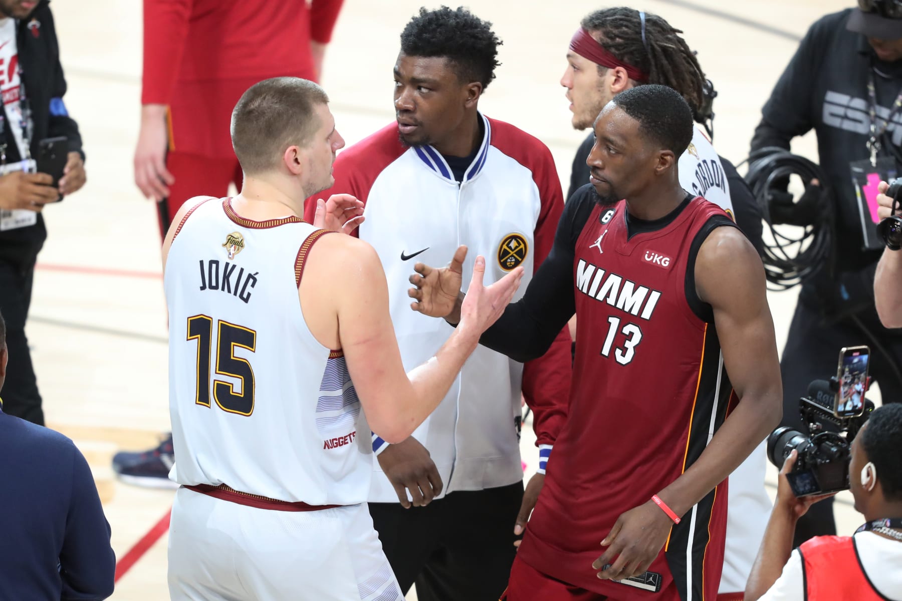 DENVER, CO - JUNE 12: Nikola Jokic #15 of the Denver Nuggets embraces Bam Adebayo #13 of the Miami Heat after game 5 of the 2023 NBA Finals on June 12, 2023 at the Ball Arena in Denver, Colorado. NOTE TO USER: User expressly acknowledges and agrees that, by downloading and/or using this Photograph, user is consenting to the terms and conditions of the Getty Images License Agreement. Mandatory Copyright Notice: Copyright 2023 NBAE (Photo by Issac Baldizon/NBAE via Getty Images)