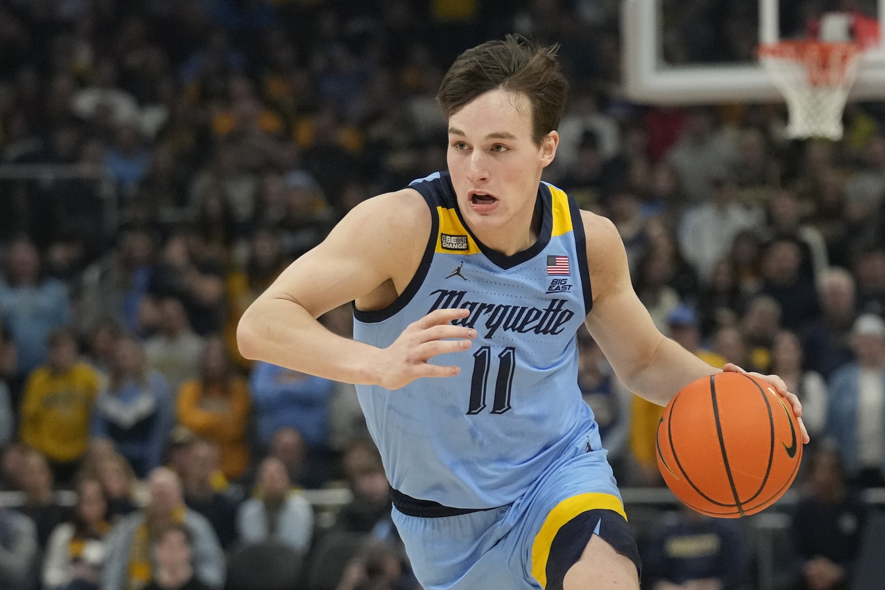 MILWAUKEE, WISCONSIN - DECEMBER 22: Tyler Kolek #11 of the Marquette Golden Eagles dribbles the ball during the first half against the Georgetown Hoyas at Fiserv Forum on December 22, 2023 in Milwaukee, Wisconsin. (Photo by Patrick McDermott/Getty Images)