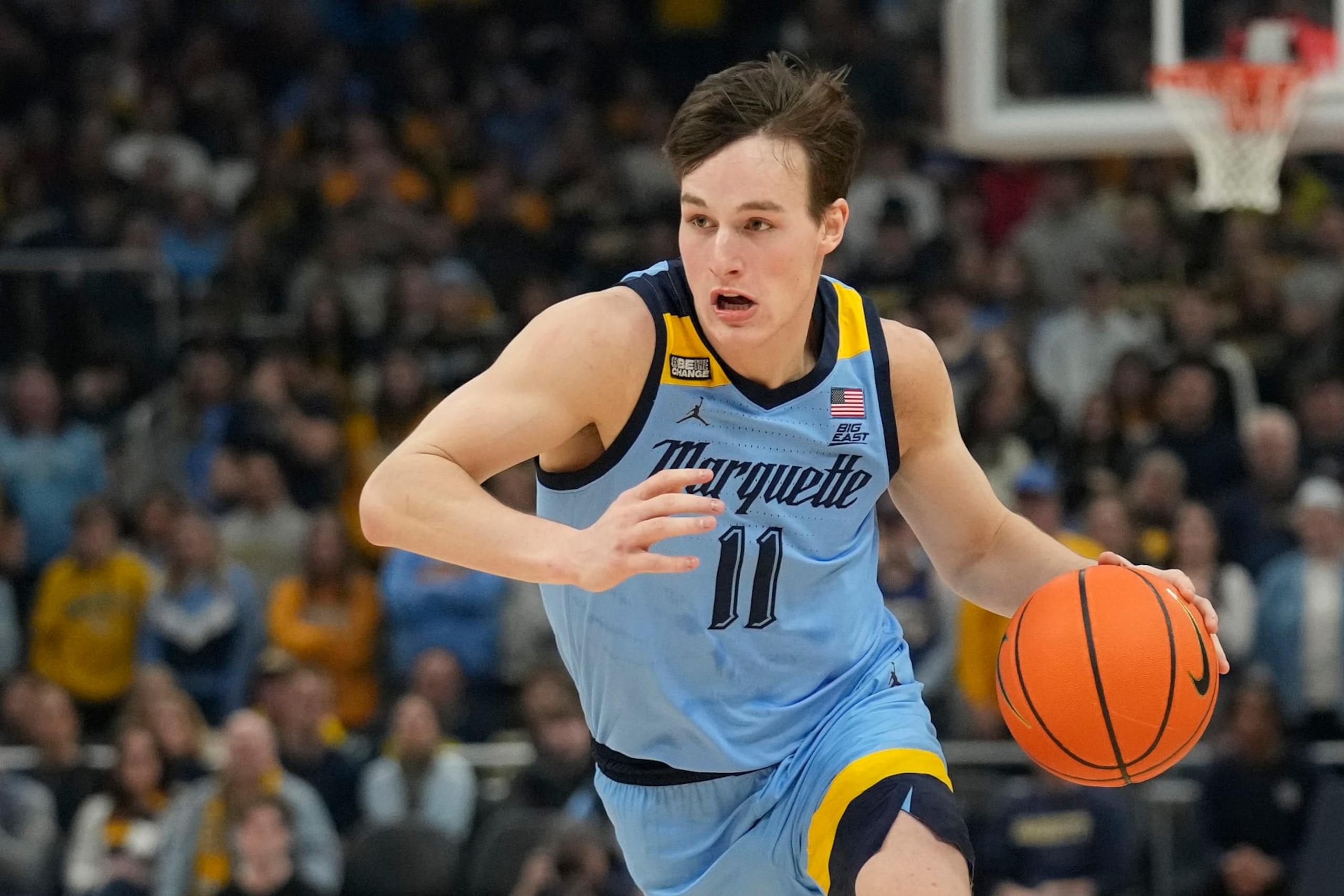 MILWAUKEE, WISCONSIN - DECEMBER 22: Tyler Kolek #11 of the Marquette Golden Eagles dribbles the ball during the first half against the Georgetown Hoyas at Fiserv Forum on December 22, 2023 in Milwaukee, Wisconsin. (Photo by Patrick McDermott/Getty Images)