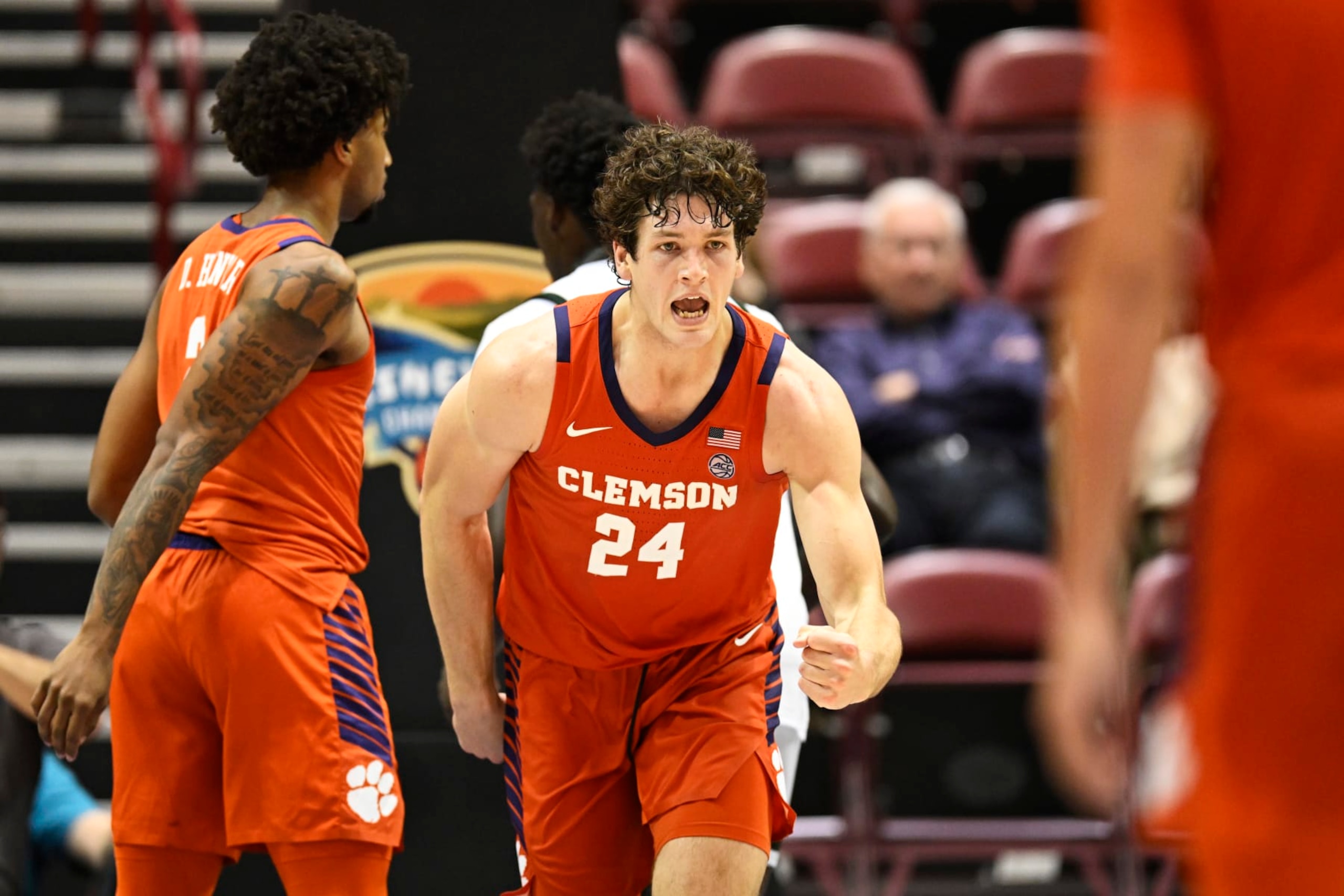 ASHEVILLE, NORTH CAROLINA - NOVEMBER 10: PJ Hall #24 of the Clemson Tigers celebrates a dunk against the UAB Blazers in the second half at Harrah's Cherokee Center on November 10, 2023 in Asheville, North Carolina. (Photo by Eakin Howard/Getty Images)