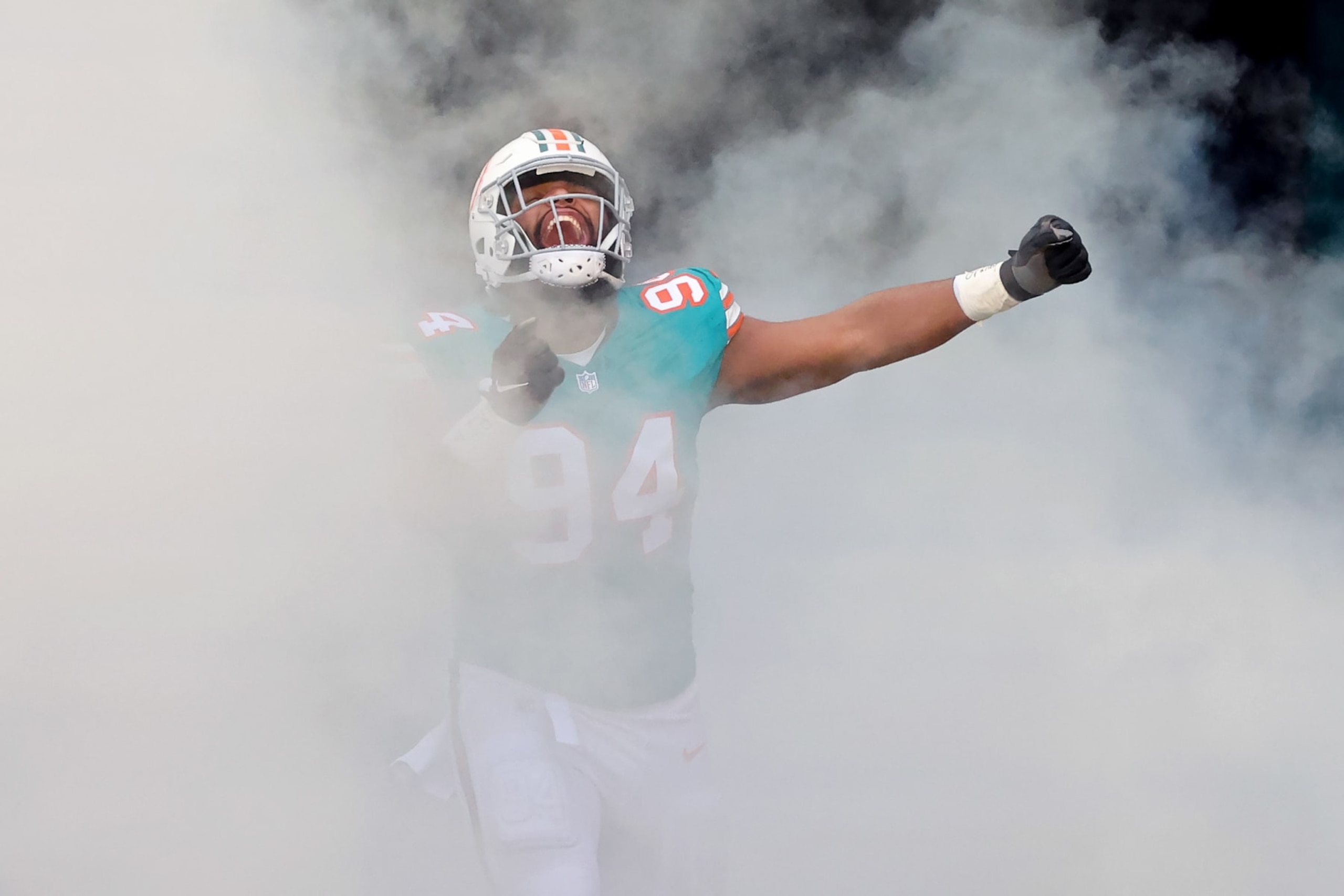 MIAMI GARDENS, FLORIDA - DECEMBER 24: Christian Wilkins #94 of the Miami Dolphins takes the field during player introductions prior to the game against the Dallas Cowboys at Hard Rock Stadium on December 24, 2023 in Miami Gardens, Florida. (Photo by Stacy Revere/Getty Images) MIAMI GARDENS, FLORIDA - DECEMBER 24: Christian Wilkins #94 of the Miami Dolphins takes the field during player introductions prior to the game against the Dallas Cowboys at Hard Rock Stadium on December 24, 2023 in Miami Gardens, Florida. (Photo by Stacy Revere/Getty Images)