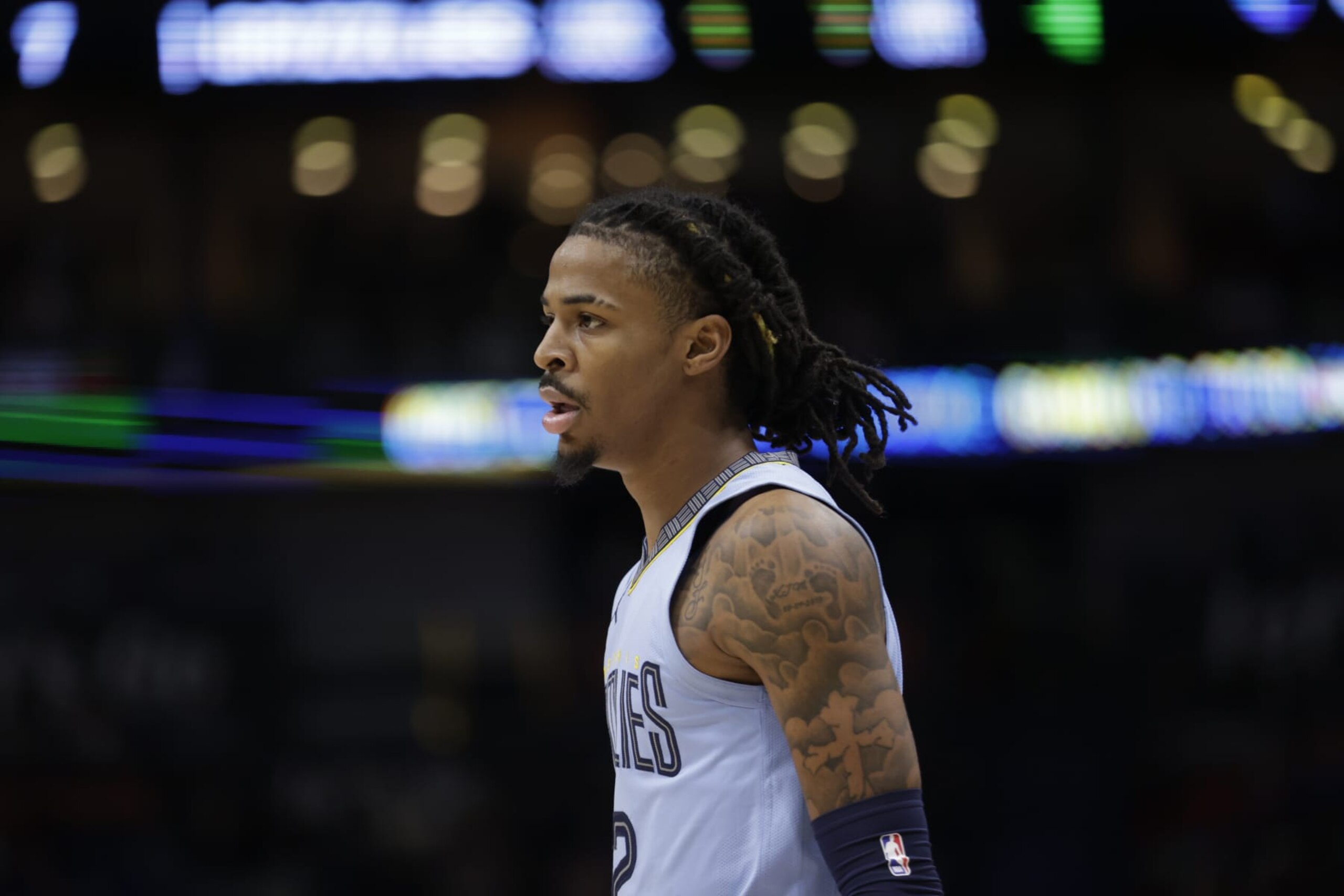 NEW ORLEANS, LA - DECEMBER 26: Ja Morant #12 of the Memphis Grizzlies looks on during the game against the New Orleans Pelicans on December 26, 2023 at the Smoothie King Center in New Orleans, Louisiana. NOTE TO USER: User expressly acknowledges and agrees that, by downloading and or using this Photograph, user is consenting to the terms and conditions of the Getty Images License Agreement. Mandatory Copyright Notice: Copyright 2023 NBAE (Photo by Derick Hingle/NBAE via Getty Images)
