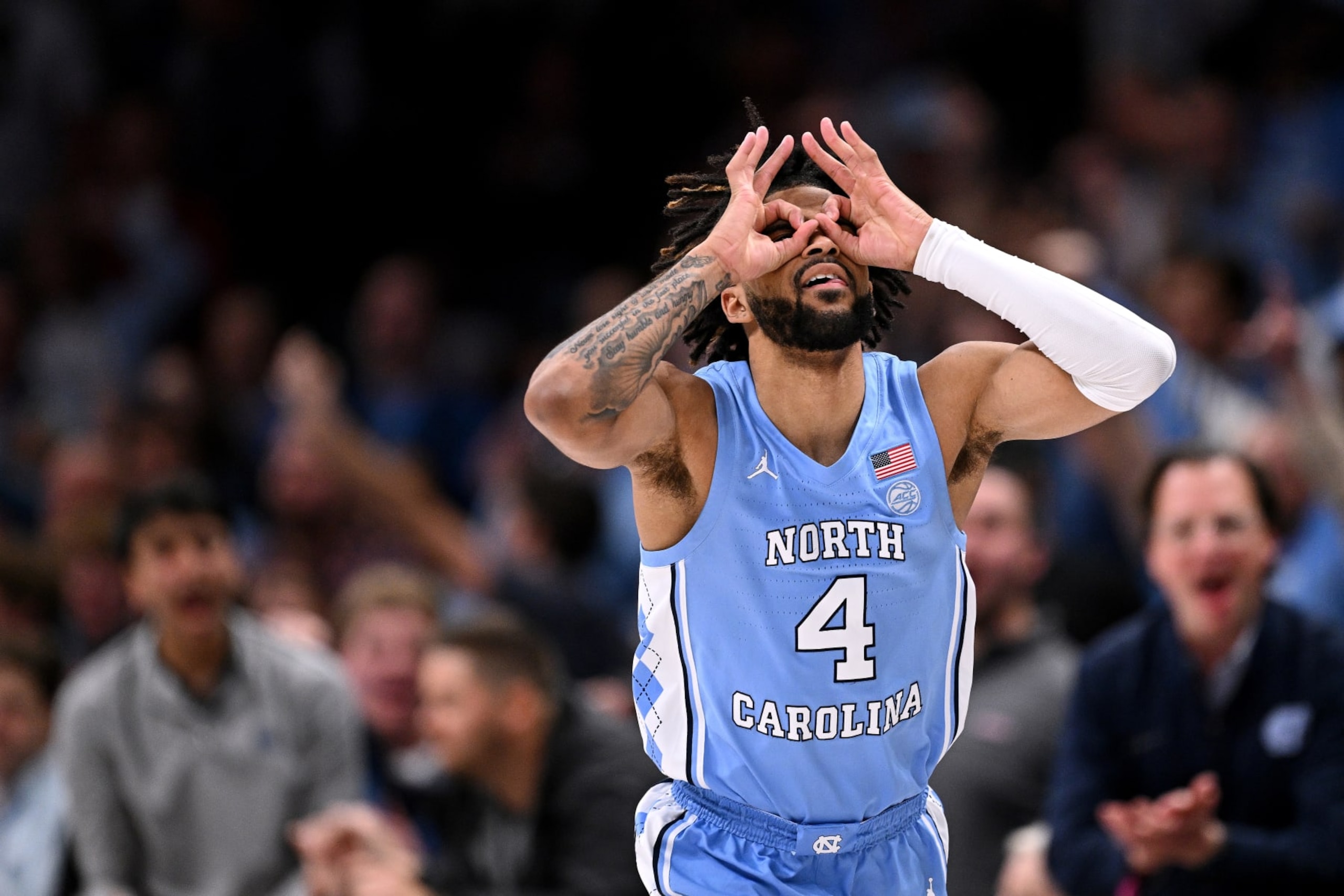 CHARLOTTE, NORTH CAROLINA - DECEMBER 20:  RJ Davis #4 of the North Carolina Tar Heels reacts after making a three-point basket against the Oklahoma Sooners in the second half of the game at Spectrum Center during the Jumpman Classic on December 20, 2023 in Charlotte, North Carolina. The Tar Heels won 81-69. (Photo by Grant Halverson/Getty Images)