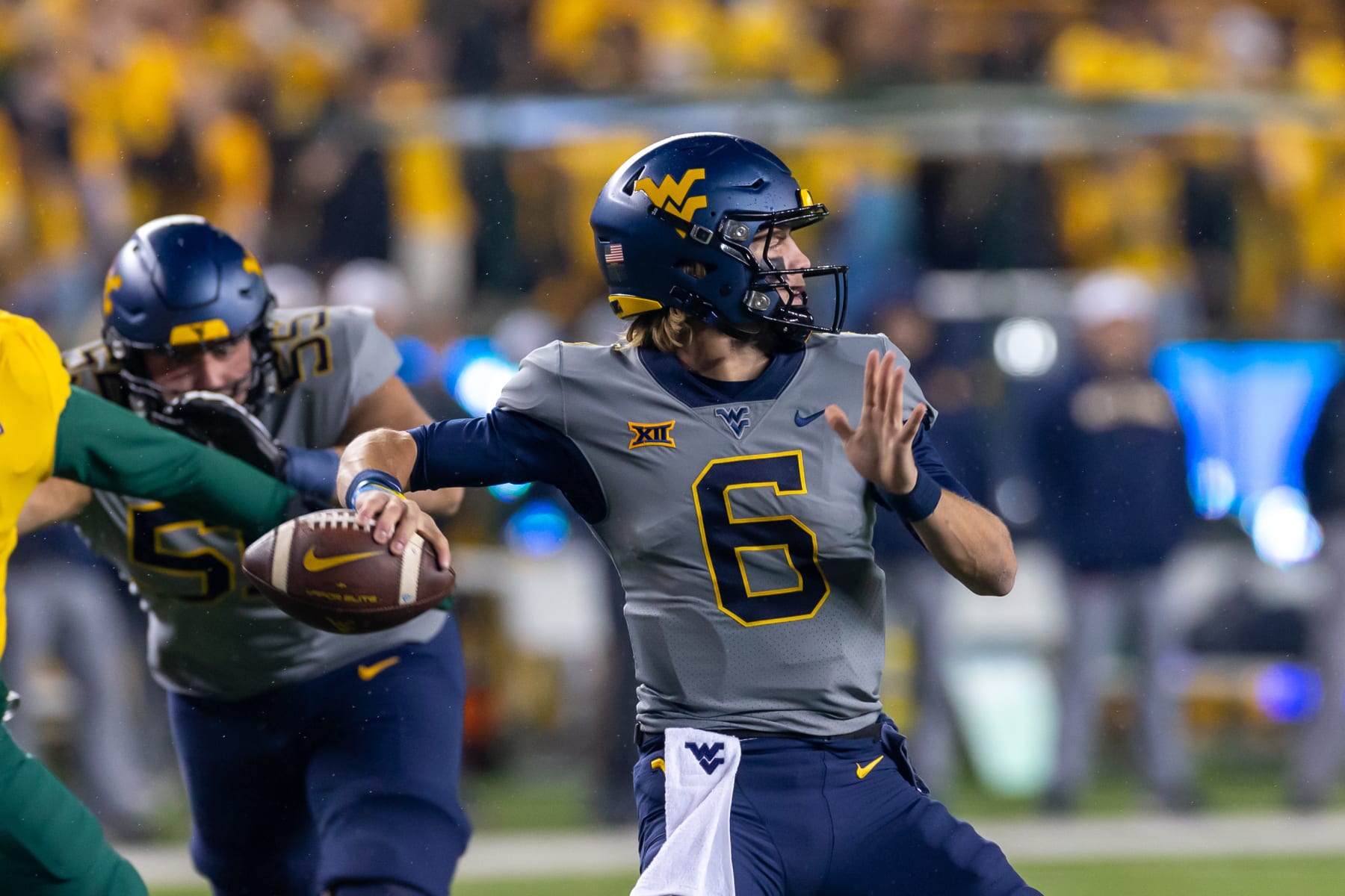 WACO, TX - NOVEMBER 25: West Virginia Mountaineers offensive lineman Landen Livingston (67) passes that ball before the Big 12 college football game between Baylor Bears and West Virginia Mountaineers on November 25, 2023, at McLane Stadium in Waco, TX. (Photo by David Buono/Icon Sportswire via Getty Images)