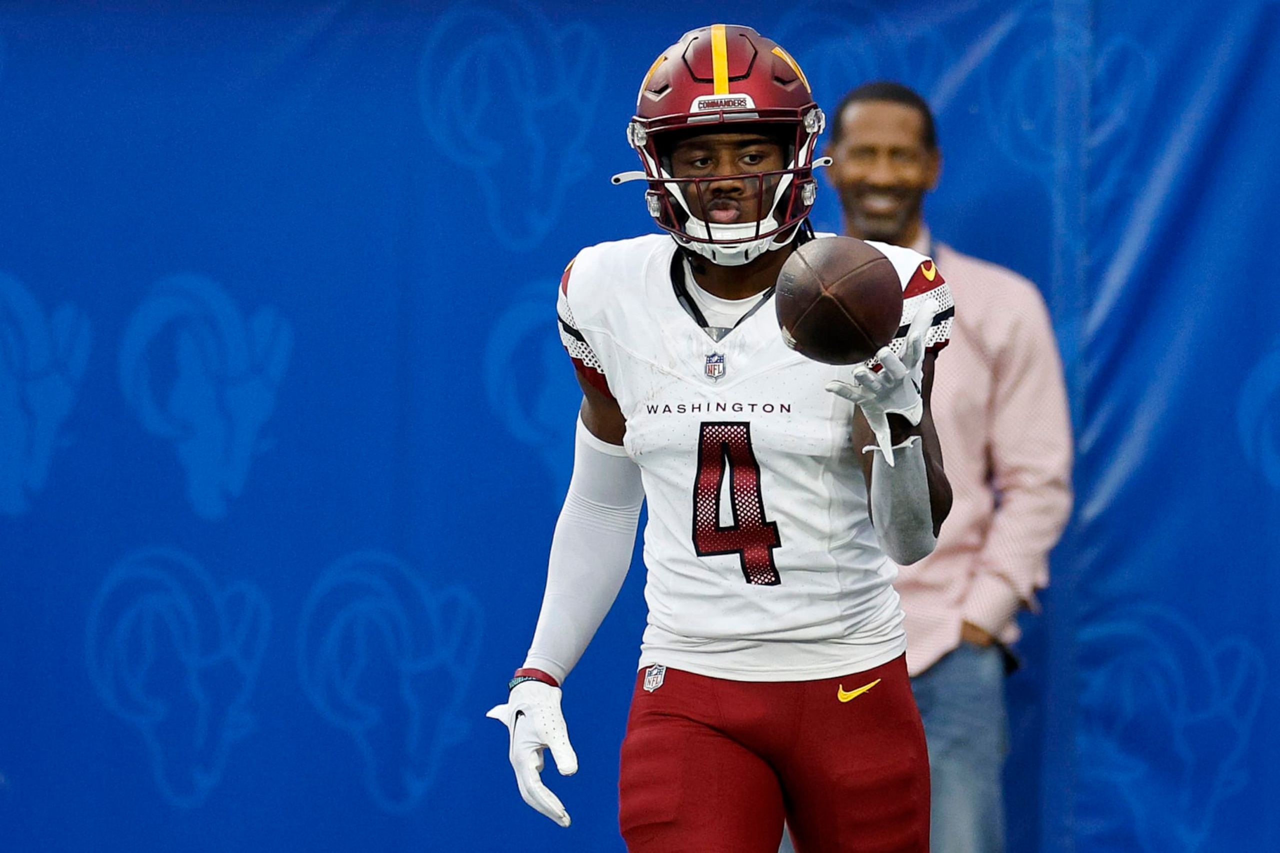 INGLEWOOD, CALIFORNIA - DECEMBER 17: Curtis Samuel #4 of the Washington Commanders reacts after catching a touchdown pass during the second half of the game against the Los Angeles Rams at SoFi Stadium on December 17, 2023 in Inglewood, California. (Photo by Kevork Djansezian/Getty Images)
