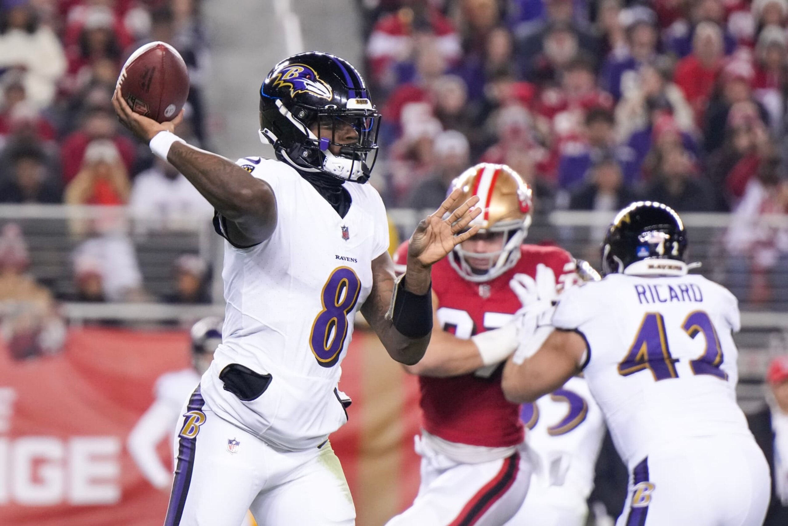 SANTA CLARA, CALIFORNIA - DECEMBER 25: Lamar Jackson #8 of the Baltimore Ravens attempts a pass during the first quarter against the San Francisco 49ers at Levi's Stadium on December 25, 2023 in Santa Clara, California. (Photo by Loren Elliott/Getty Images)