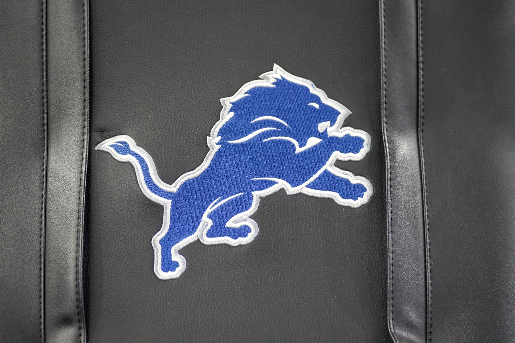 DETROIT, MICHIGAN - SEPTEMBER 17: The Detroit Lions logo is pictured against the Seattle Seahawks at Ford Field on September 17, 2023 in Detroit, Michigan. (Photo by Nic Antaya/Getty Images)