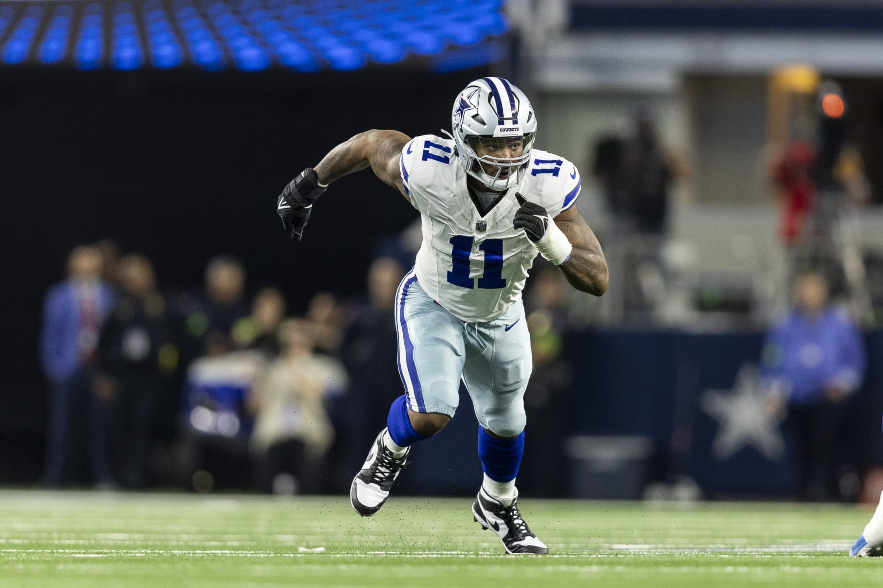 ARLINGTON, TEXAS - NOVEMBER 30: Micah Parsons #11 of the Dallas Cowboys runs around the edge during an NFL football game between the Dallas Cowboys and the Seattle Seahawks at AT&T Stadium on November 30, 2023 in Arlington, Texas. (Photo by Michael Owens/Getty Images)