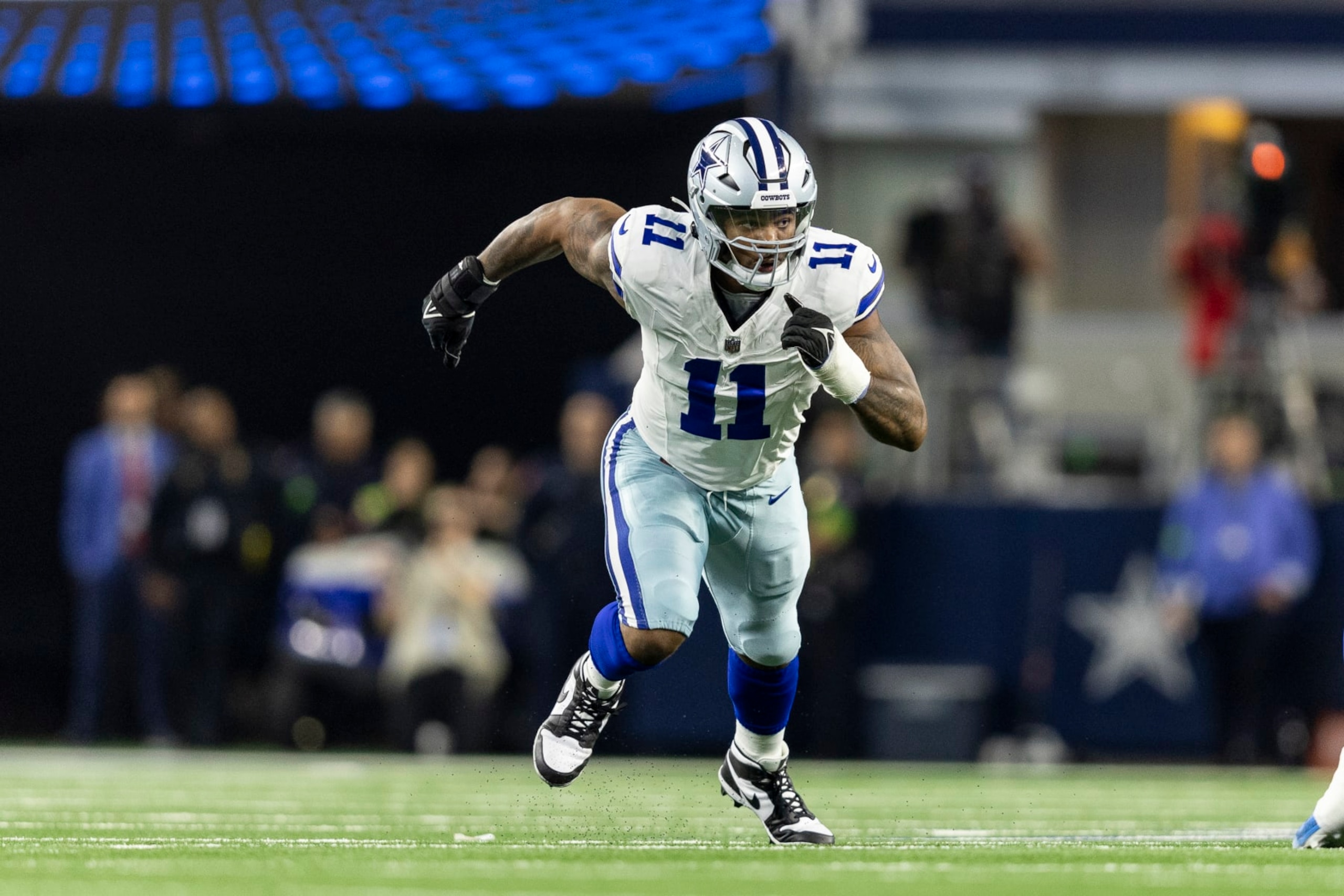 ARLINGTON, TEXAS - NOVEMBER 30: Micah Parsons #11 of the Dallas Cowboys runs around the edge during an NFL football game between the Dallas Cowboys and the Seattle Seahawks at AT&T Stadium on November 30, 2023 in Arlington, Texas. (Photo by Michael Owens/Getty Images)
