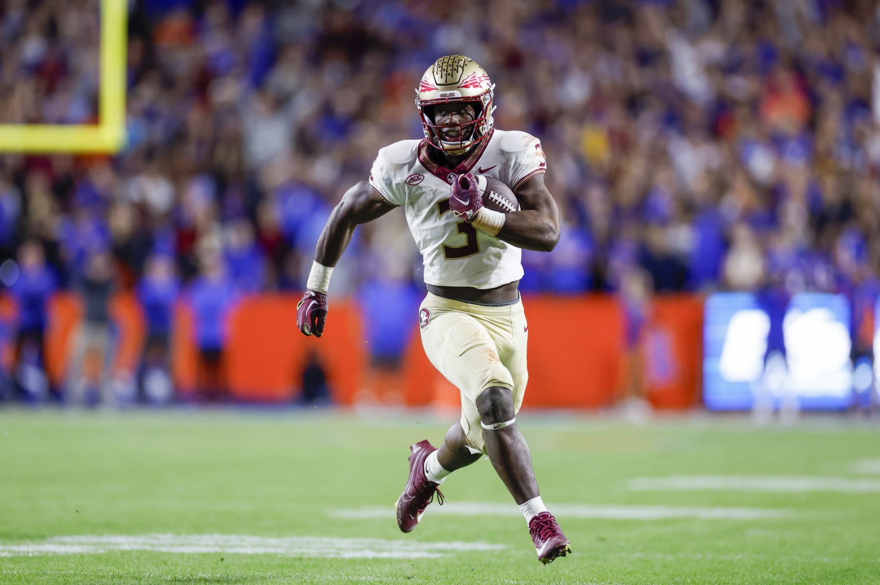 GAINESVILLE, FL - NOVEMBER 25: Florida State Seminoles running back Trey Benson (3) runs with the ball during the game between the Florida Gators and the Florida State Seminoles on November 25, 2023 at Ben Hill Griffin Stadium at Florida Field in Gainesville, Fl. (Photo by David Rosenblum/Icon Sportswire via Getty Images)